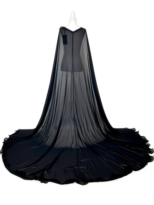 Elevate your formal look with the Marc Defang 2011 Long Chiffon Formal Pageant Cape. This detachable cape features 2 panels for a customizable fit and a stunning chiffon fabric that will flow gracefully as you move. Perfect for pageants, this cape adds that extra touch of elegance to your ensemble.   Ladies ONE SIDE FITS ALL