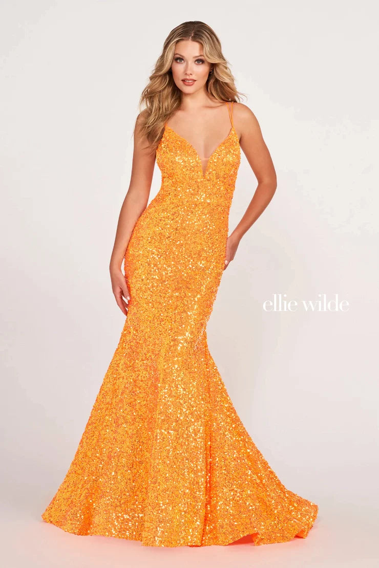 Look sophisticated and graceful in Ellie Wilde EW34016. The signature Iridescent color shifting sequins and mermaid silhouette make this timeless corset dress a perfect choice for a formal occasion. Captivate everyone in the room with its sparkling iridescent material and backless v-neckline.  Sizes: 00-20  Colors: ORANGE, LIGHT BLUE, HOT PINK, IRIS, FOREST LIGHT, PURPLE RAIN  https://dy9ihb9itgy3g.cloudfront.net/static/themes/EllieWilde/Spring_2023/EW34016.mp4