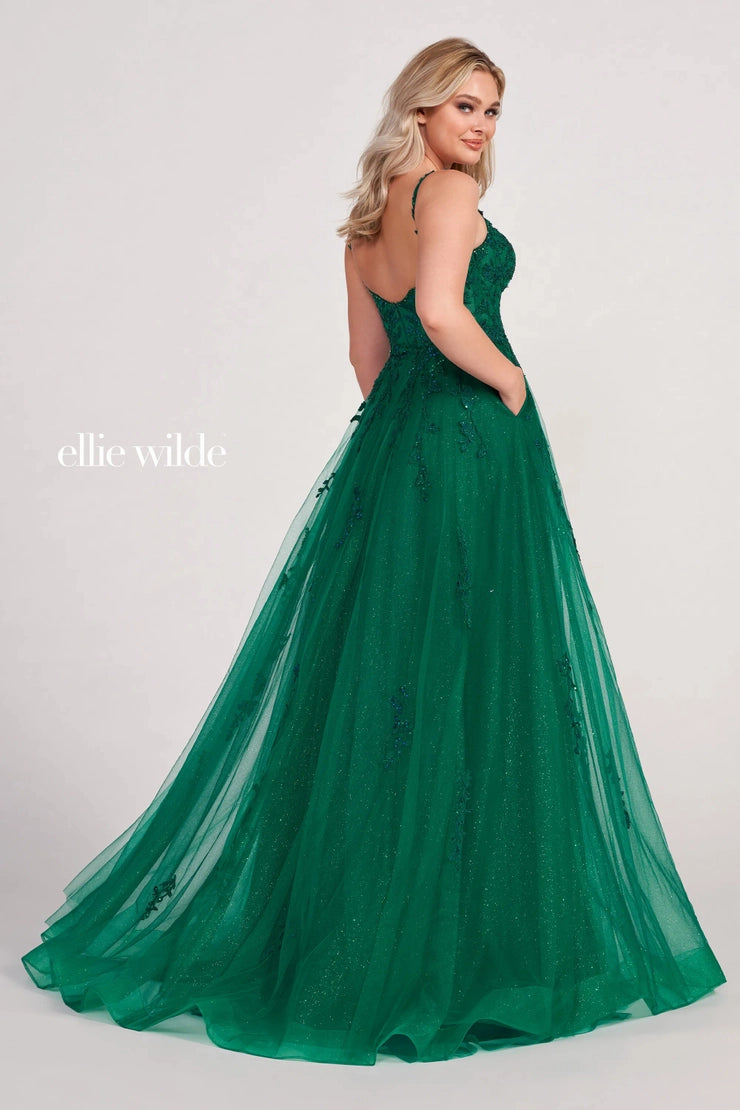 Discover a stunning combination of sheer lace shimmer and A-line silhouette with the Ellie Wilde EW34116 Prom Dress. Highlight your figure with a daring maxi slit, perfect for a formal event. This gown exudes elegance and sophistication, making you stand out amongst the crowd. Turn heads in this must-have dress.