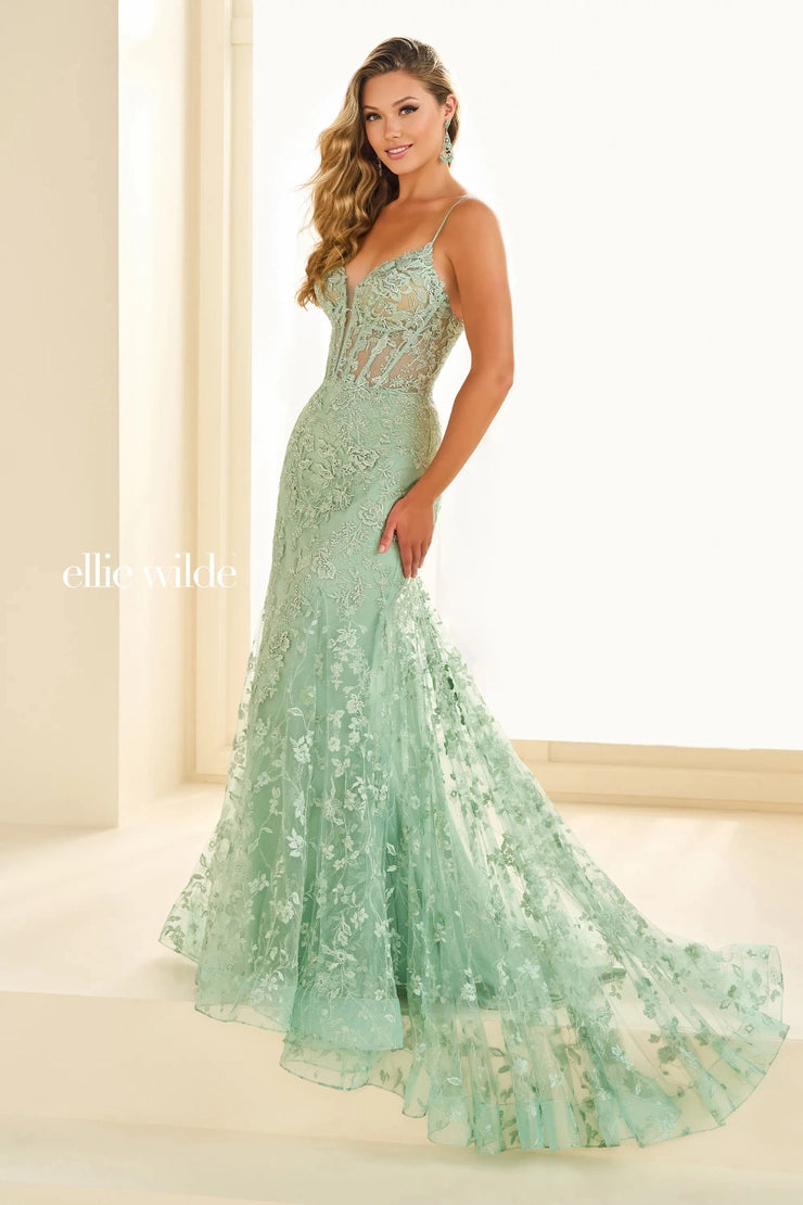 Experience elegance and grace in our Ellie Wilde EW36008 Long Lace Mermaid Corset Prom Dress. Made with delicate lace and a figure-flattering mermaid silhouette, this dress exudes sophistication. The corset-style back and V-neckline add a touch of glamour, while the train adds a dramatic flourish. Perfect for any formal evening event, make a statement in this stunning gown.

Sizes: 00-2

Colors: Black, Candy Pink, Emerald, Light Blue, Light Yellow, Purple, Royal Blue, Sage, Strawberry