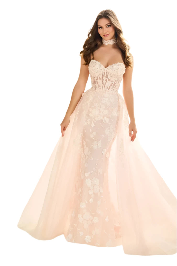 Luxurious and elegant, the Ellie Wilde EW36028 wedding dress is designed for the modern bride. The sequin lace shimmer adds a touch of glamour, while the overskirt and corset create a dramatic silhouette. The sheer choker adds a hint of mystery. Perfect for a reception or bridal event, this dress will make you stand out in any colored theme.

Sizes: 00-24

Colors: Black, Ivory, Petal