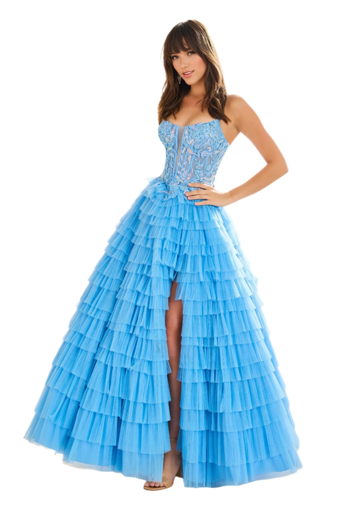 Elevate your prom look with the Ellie Wilde EW36086 Long Sheer Sequin Lace Corset Dress. This stunning A-line gown features a sheer sequin lace corset With a layered design and daring front slit, this ball gown will make you feel like a true princess on your special night