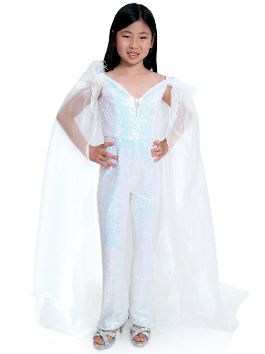 Marc Defang 8099K is a KIDS long pageant formal wear jumpsuit that is made of sequins and has off the shoulder straps.  The straps are attached to a cape with feathers at the shoulders.  Wow the crowd at your next pageant.  Available colors:  Pink, Turquoise, White, Black, Royal