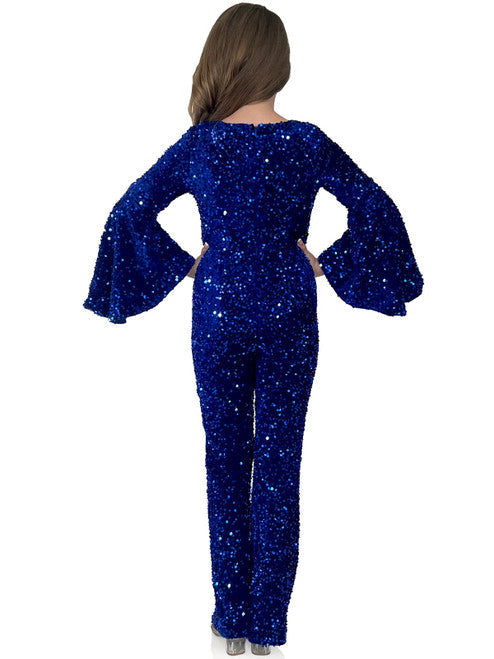 Inject a bit of sparkle and glamour into special occasions with Marc Defang's 8225K Girls Velvet Sequin Pageant Jumpsuit. This jumpsuit features a high neck with long bell sleeves and is finished with a beautiful sequin design for an eye-catching effect. Perfect for pageants and special occasions.  Sizes:  4,5,6,7,8,9,10,11,12,13,14  Colors: Yellow, White AB, Royal, Hot Pink, Purple, Light Blue, Light Pink, Neon Green, Lilac