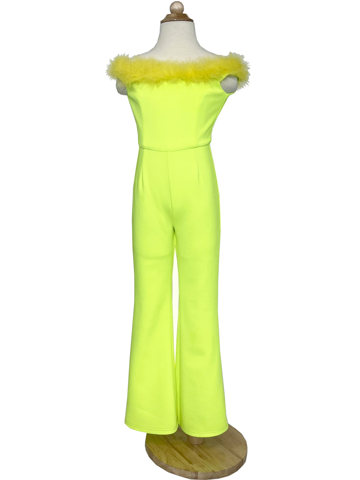 Marc Defang 8185K Pageant Jump suite with feather neck line off the shoulder  Feather neckline Scuba body material Jumpsuit style Center back invisible zipper Fully Lined  Available Sizes: 2-14  Available Colors: Pink, Lilac, Red, White, Royal Blue, Hot Pink, Aqua, Yellow, Emerald, Mint