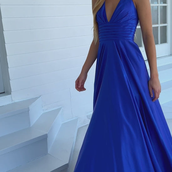 Stay elegant and sophisticated all night long with the Ava Presley 39562 Long Prom Dress. Featuring a flattering A-line silhouette, beautifully pleated bodice, and a stunning open back, this dress is perfect for any formal occasion or pageant event. Feel confident and glamorous in this timeless and stylish gown.