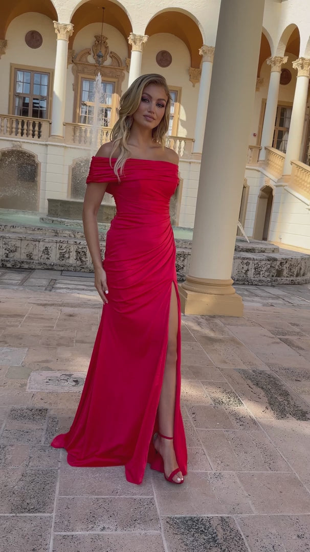 This Ava Presley long prom dress is the epitome of elegance and sophistication. The off-shoulder design flatters the neckline, while the fitted silhouette accentuates your curves. The high slit and ruching details add a touch of drama to this formal pageant gown. Perfect for making a statement at any special occasion.