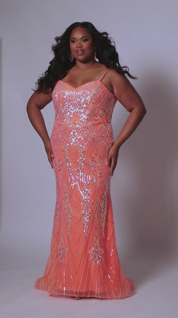 Look beautiful and timeless in this Sydneys Closet SC7366 Long Prom Dress. The fitted plus size gown is embellished with dazzling sequins and a graceful train. Perfect for your next formal event, this elegant dress is sure to make you the bright star of the night. Look glamorous on your big night in this sexy fitted Trumpet gown.