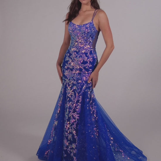 Show up in style with the Ellie Wilde EW35008 Long Sequin Shimmer Mermaid Prom Dress. Made with Glitter Sequin Tulle, this elegant gown has a Scoop Neckline, Sleeveless sleeves, Lace-Up back, and a Natural Waistline. Experience maximum comfort with the Side Waist Mesh Inset and Mermaid silhouette. Show off your curves in this figure-hugging dress!  COLOR: ORANGE, MAGENTA, ULTRA VIOLET, PERIWINKLE/OPAL SIZE: 00 - 20