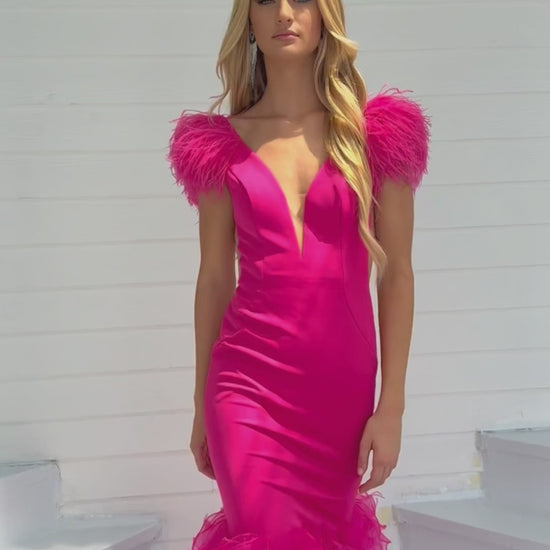 Transform into a red carpet sensation with the Ava Presley 39312 Fitted Long Prom Dress. Designed with a plunging V neckline, ruffles, and feathers, this formal pageant gown exudes glamour and sophistication. Stand out from the crowd and make a bold statement at your next event.