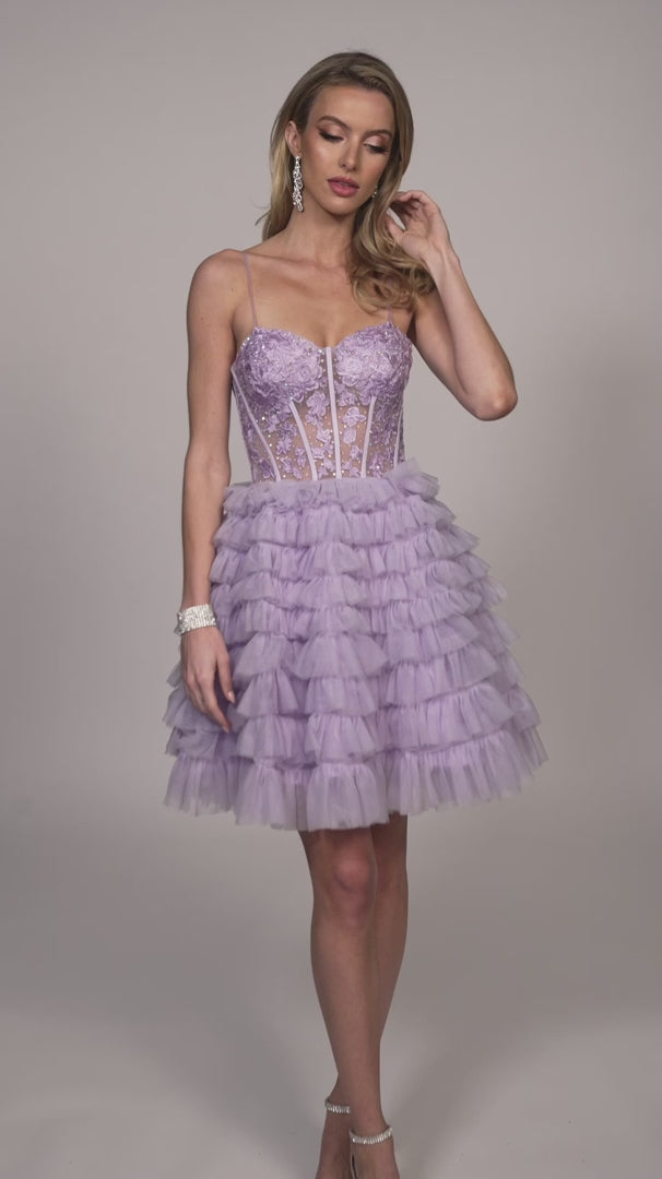 Elevate your look with the Dave &amp; Johnny 11766 Layer Ruffle A Line Homecoming Dress. The sheer lace corset and layered ruffles create a flattering A-line silhouette, perfect for any cocktail event. This dress combines style and comfort, making it a must-have for your