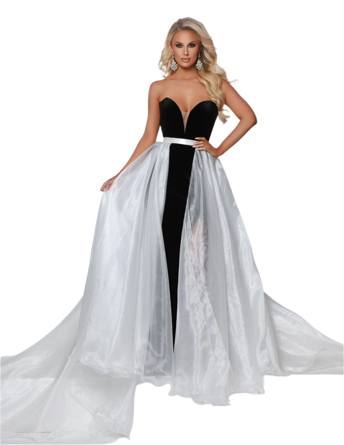 Experience the versatility of the Johnathan Kayne Detachable Overskirt. Designed with organza fabric and a wire hem, this formal wear accessory adds a touch of glamour to any pageant or special event. Transform your look with the detachable feature and elevate your style game. A true wardrobe essential, this poly organza overskirt allows you to personalize your look for various occasions. Whether paired with a gown, a cocktail dress, or even a casual ensemble, it adds an instant dose of elegance and flair.