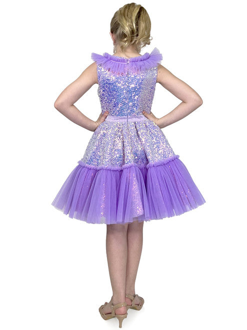 Marc Defang Kids 5111 Dress is a stunning cocktail dress for special occasions. Crafted from sequin tulle with pleated ruffle and layered detailing, it is sure to turn heads. Perfect for pageants, it will make your little one feel like a princess. Please inquire for additional colors.  Sizes: 4,5,6,7,8,9,10,11,12,13,14  Colors: Lilac, Mint, Royal Blue