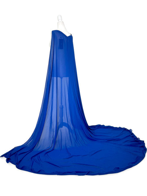 Elevate your formal look with the Marc Defang 2011 Long Chiffon Formal Pageant Cape. This detachable cape features 2 panels for a customizable fit and a stunning chiffon fabric that will flow gracefully as you move. Perfect for pageants, this cape adds that extra touch of elegance to your ensemble.   Ladies ONE SIDE FITS ALL