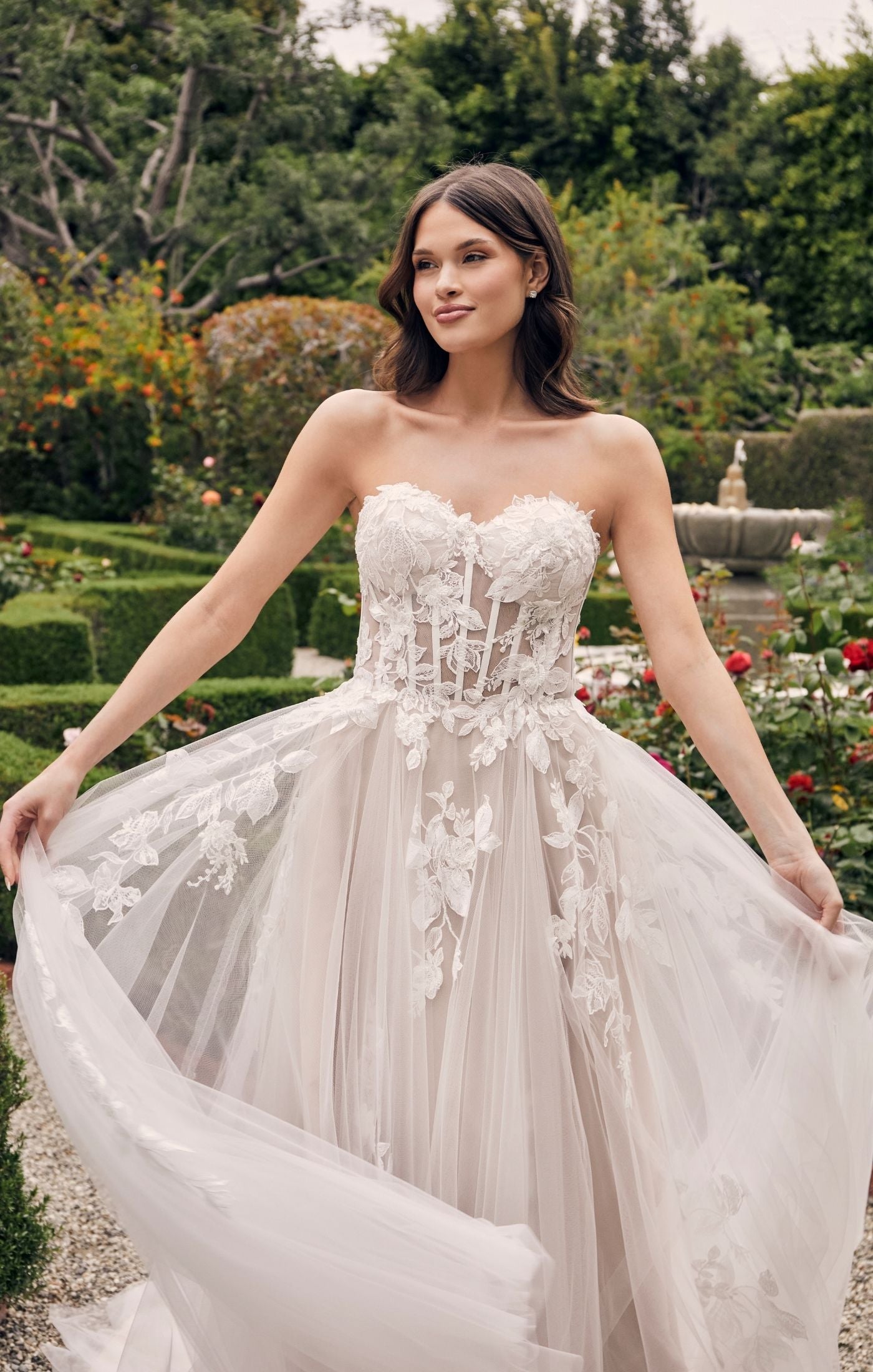 Casablanca Bridal 2537 Adalaide A-Line Sheer Floral Corset Strapless Sweetheart Neckline Wedding Gown. 2537 Adalaide, a stunning A-line look consisting of a soft, gathered tulle features a flowy skirt and intricate corset bodice with a wealth of style details such as, exposed inner boning & transparent panels.