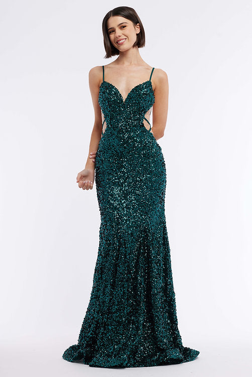 Look stunning in Vienna Prom 8878. Crafted from a lustrous sequined fabric, this dress features a backless and sheer cut-out design. The elegant fitted bodice fits snugly to flatter your curves, making this the perfect formal or pageant dress.  Sizes: 00-16  Colors: Fuchsia, Lilac, Green