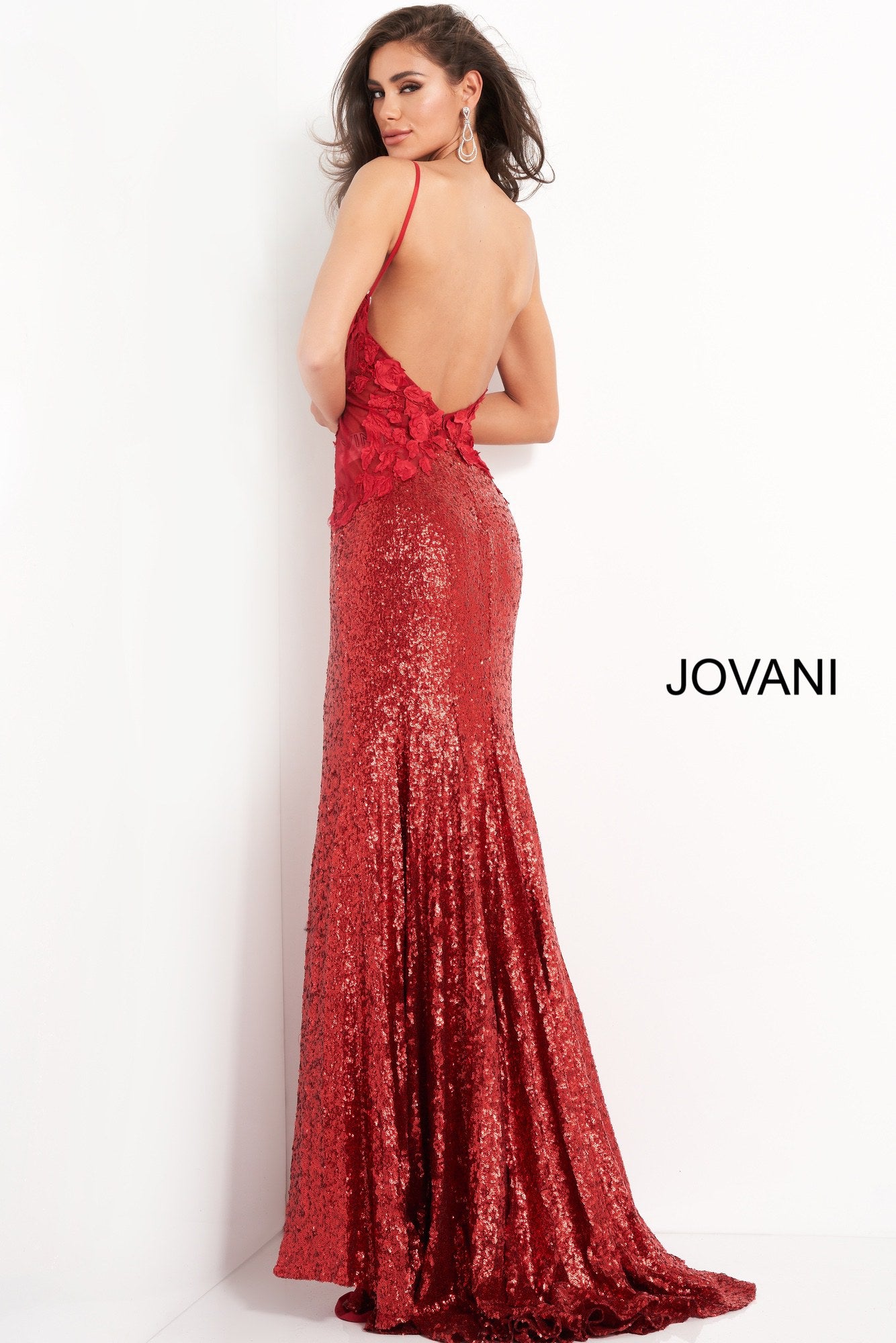 Jovani 06426 is a Long Fitted Stretch Petite Sequin Shimmering Formal Evening Gown. This Stunning Prom Dress Features a Deep V  Plunging Neckline and Detailed floral Appliques. spaghetti straps lead around to an open back. This Backless Pageant Gown throws a glamorous appeal with its lush sweeping sequin train! Sexy thigh Slit in skirt. Available Sizes: 00,0,2,4,6,8,10,12,14,16,18,20,22,24  Available Colors: Black, Cream, Red, Light Blue