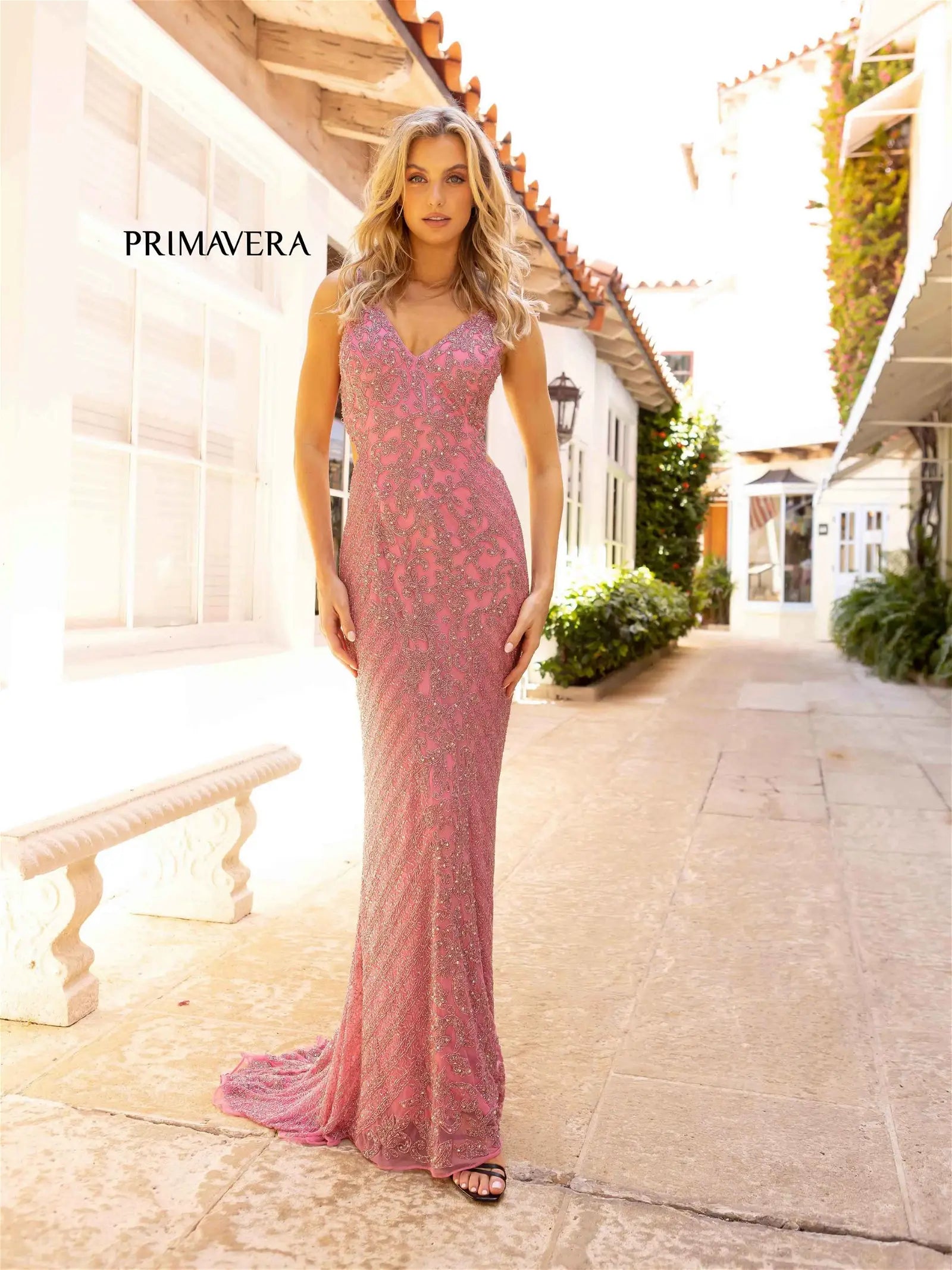 Primavera Couture 12061 Prom Dress Long Beaded gown. This gown has such a beautiful design on it. it also has an open back. 