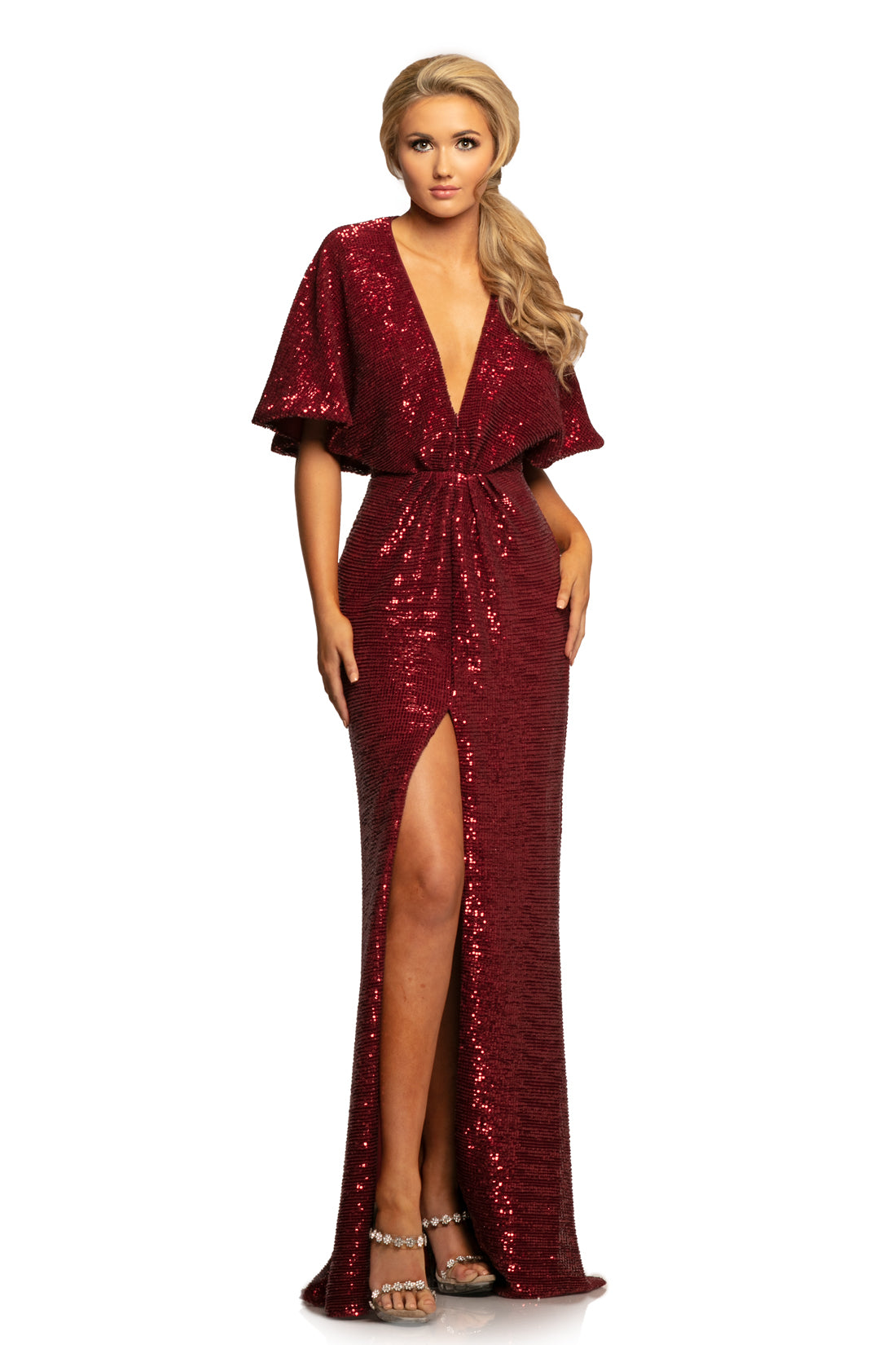 Johnathan Kayne 2015 is a sequin Prom Dress, Formal Evening Wear Gown, Party Dress & Semi Formal Dress.  This Sequin Embellished Gown Features A Deep V Neck with draping sleeves and a ruched bodice for a curvy fit. Slit in the front level with the deep neckline. Great Sophisticated wedding dress in white or Fun Modern Prom Dress in Mermaid!