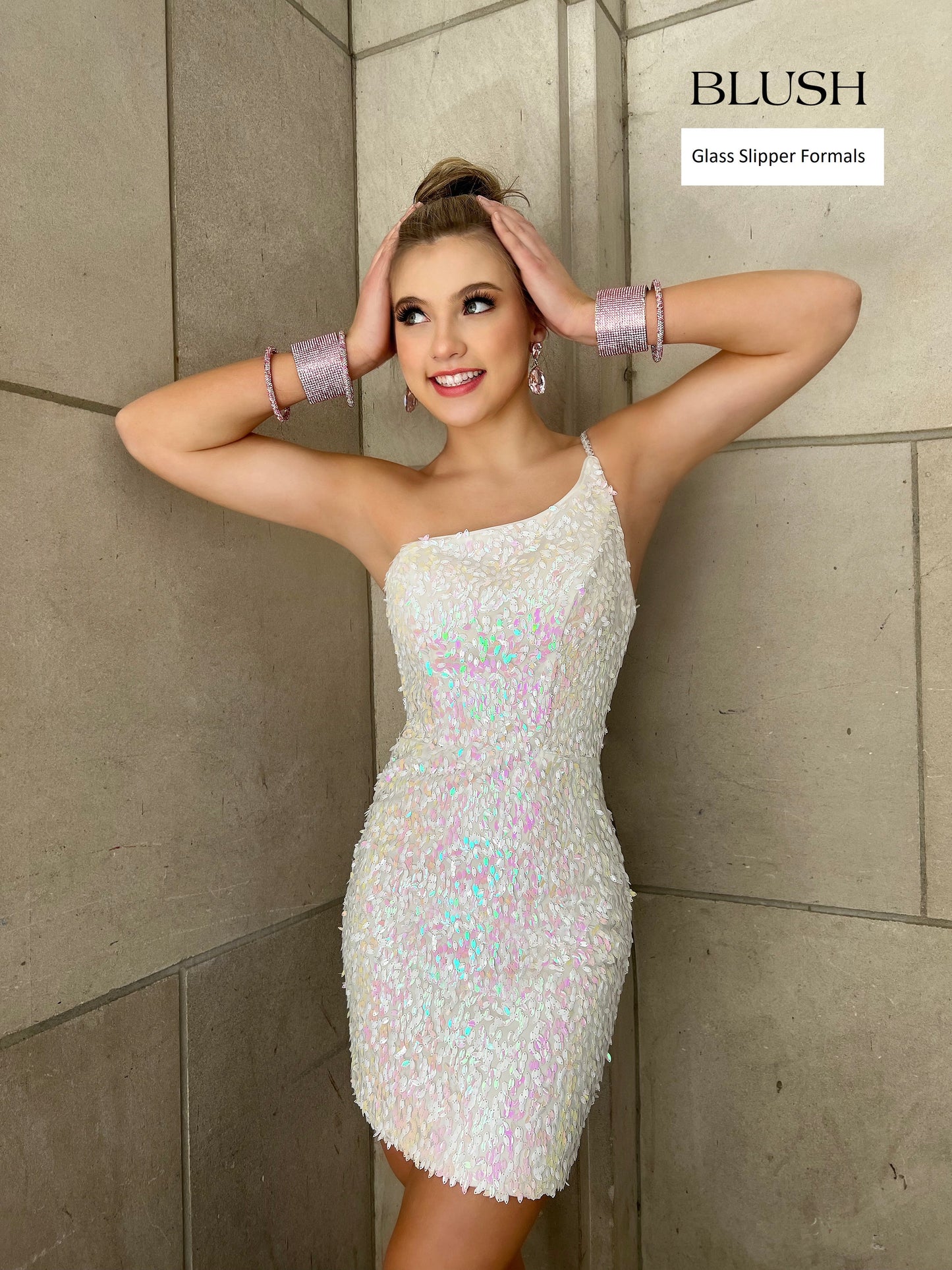 Blush Prom 20410 is a Short Fitted One Shoulder Cocktail Dress with iridescent oblong Sequins. This Backless Formal Gown Features an embellished spaghetti strap. Fun formal for any event!  Available Sizes: 0-24  Available Colors: Aqua/AB, Blue & White/AB, Blue & Pink/AB