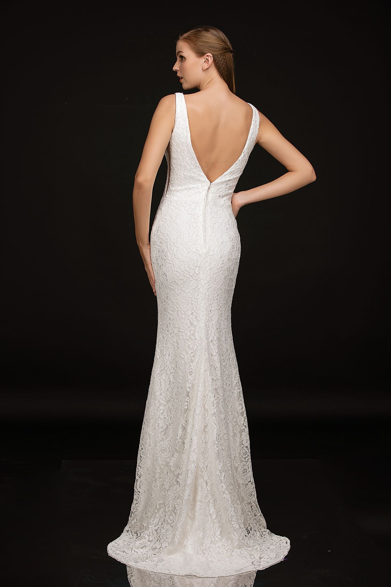 Nina Canacci 2229 is a Long Fitted solid Ivory Lace formal destination wedding dress, pageant gown & informal Bridal. Featuring a plunging V Neckline and open V Back. small sweeping train. Destination Lace Wedding Dress Open Back V Neck  Available Sizes: 00-10  Available Colors: Ivory