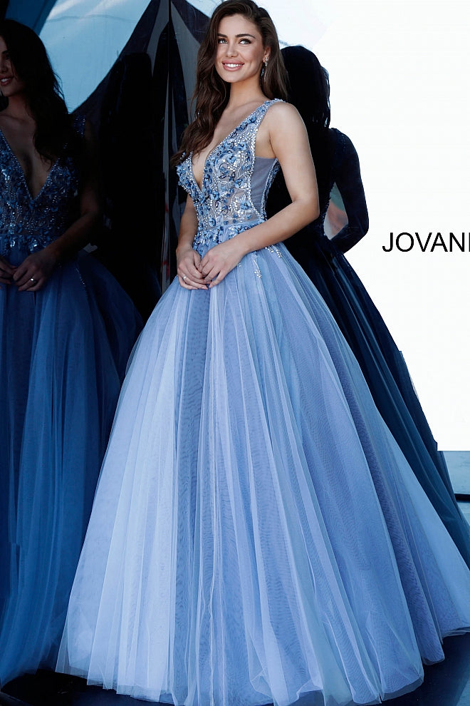 Jovani 3110 is a stunning tulle ball gown Prom Dress. Embellished 3D Floral Appliques on Sheer Illusion Bodice. Deep V Neckline & Back.  This gown would be a Perfect Sexy Wedding Dress In Ivory!  Available Sizes: 00, 0, 2, 4, 6, 8, 10, 12, 14, 16, 18, 20, 22, 24  Available Colors: blue, ivory, red