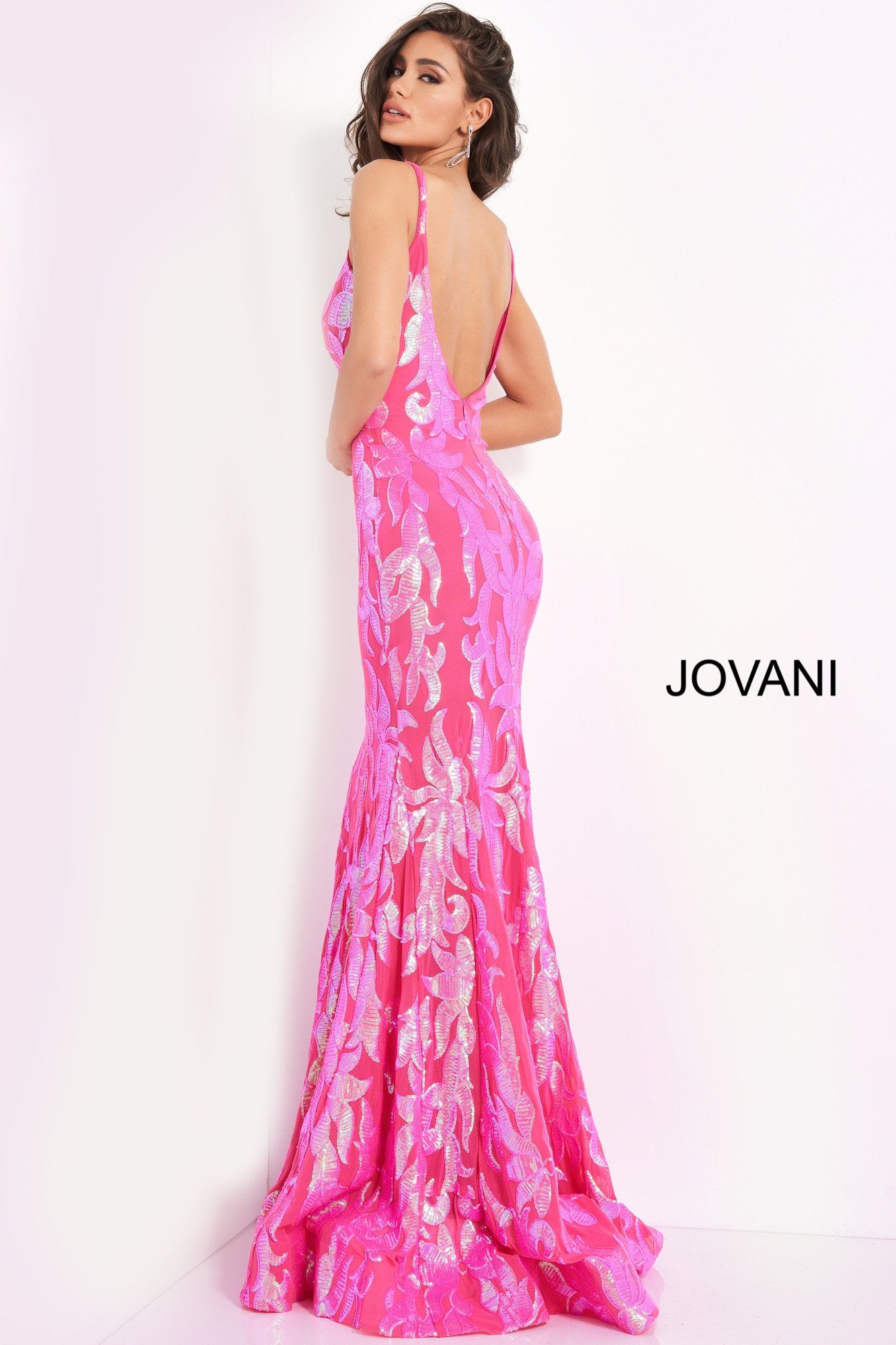 Jovani 3263 is a long Fitted Mermaid Prom Dress with a damask print sequin embellished pattern. Plunging V Neckline and open V Back. Lush Trumpet Skirt is great for the stage in this formal evening gown & Pageant Dress. Glass Slipper Formals