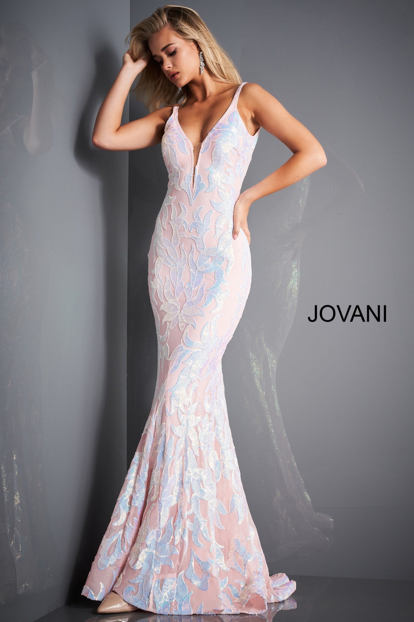 Jovani 3263 is a long Fitted Mermaid Prom Dress with a damask print sequin embellished pattern. Plunging V Neckline and open V Back. Lush Trumpet Skirt is great for the stage in this formal evening gown & Pageant Dress. Glass Slipper Formals