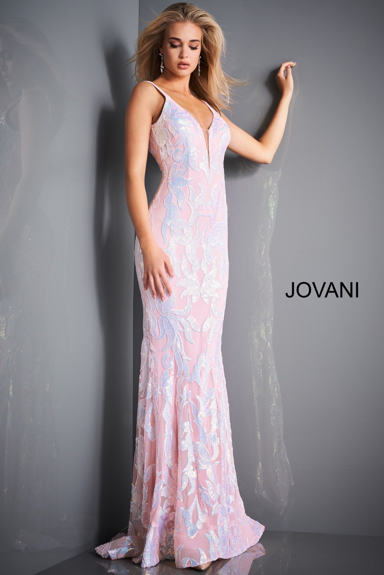 Jovani 3263 is a long Fitted Mermaid Prom Dress with a damask print sequin embellished pattern. Plunging V Neckline and open V Back. Lush Trumpet Skirt is great for the stage in this formal evening gown & Pageant Dress. Glass Slipper Formals