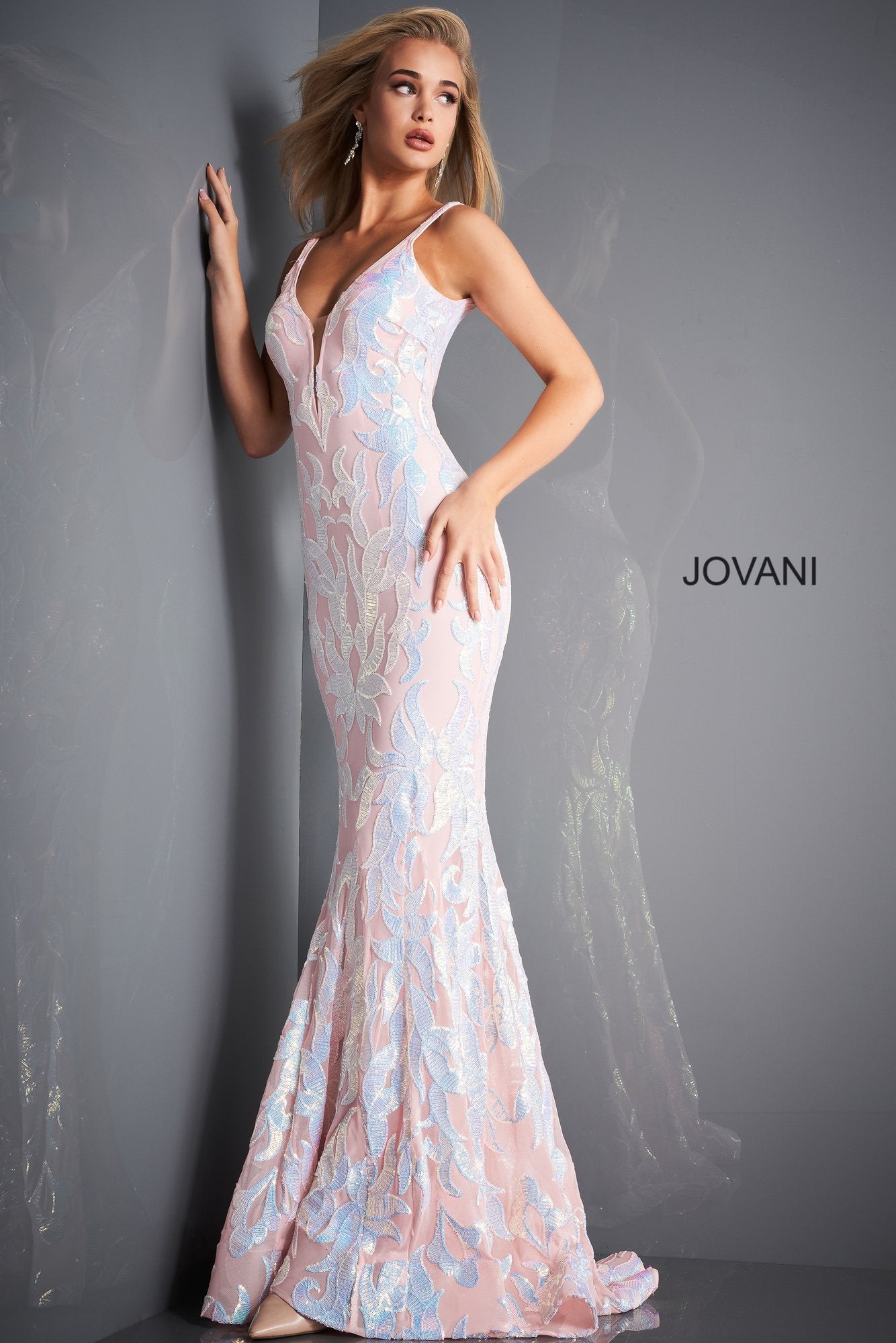 Jovani 3263 is a long Fitted Mermaid Prom Dress with a damask print sequin embellished pattern. Plunging V Neckline and open V Back. Lush Trumpet Skirt is great for the stage in this formal evening gown & Pageant Dress. Glass Slipper Formals