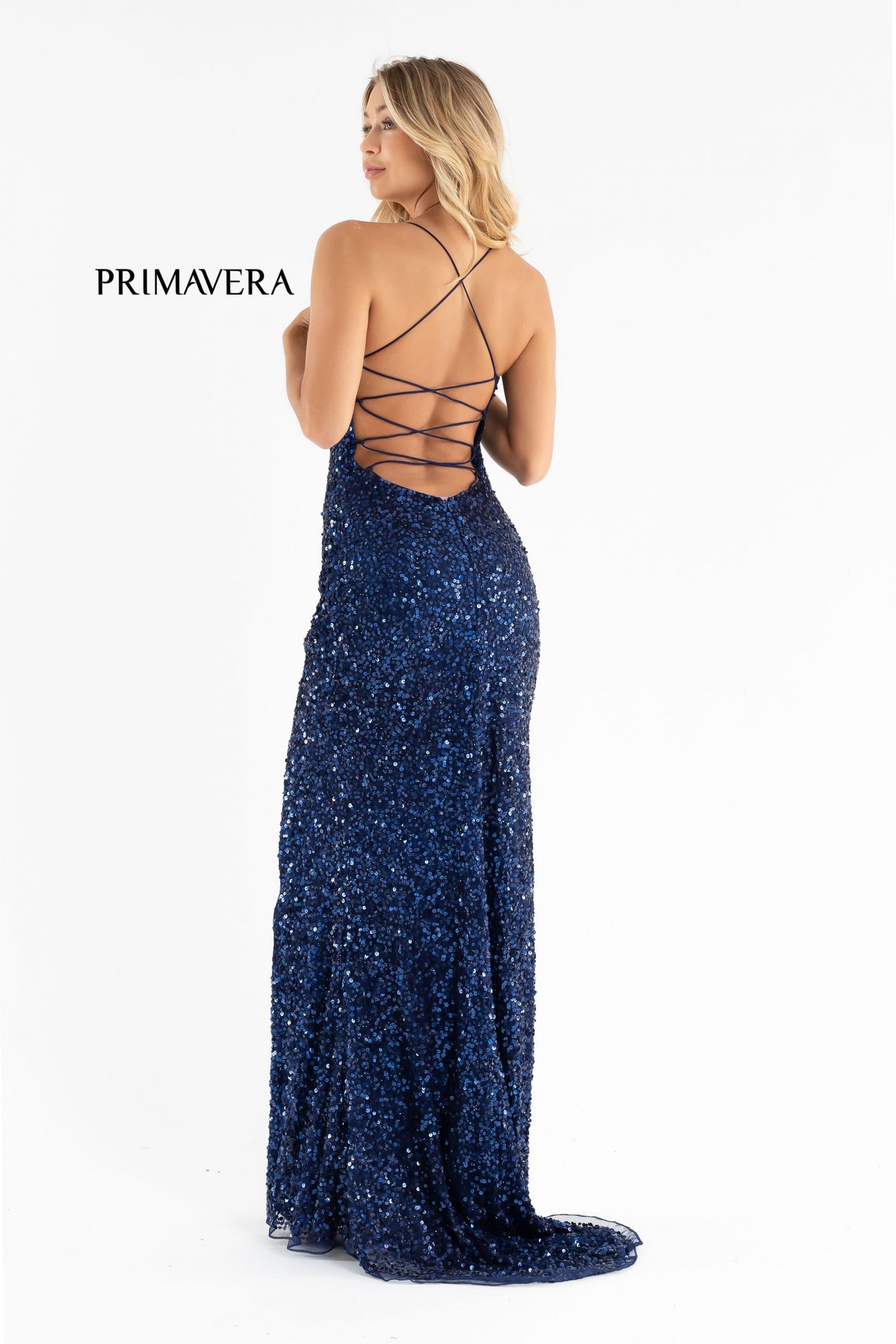 Primavera Couture 3290 This prom dress adds a pop to the multi sequins dress.  With a scoop neckline and spaghetti straps that cross and tie in the back.  This long evening dress has a side slit.  Available sizes:  000, 00, 0, 2, 4, 6, 8, 10, 12, 14, 16