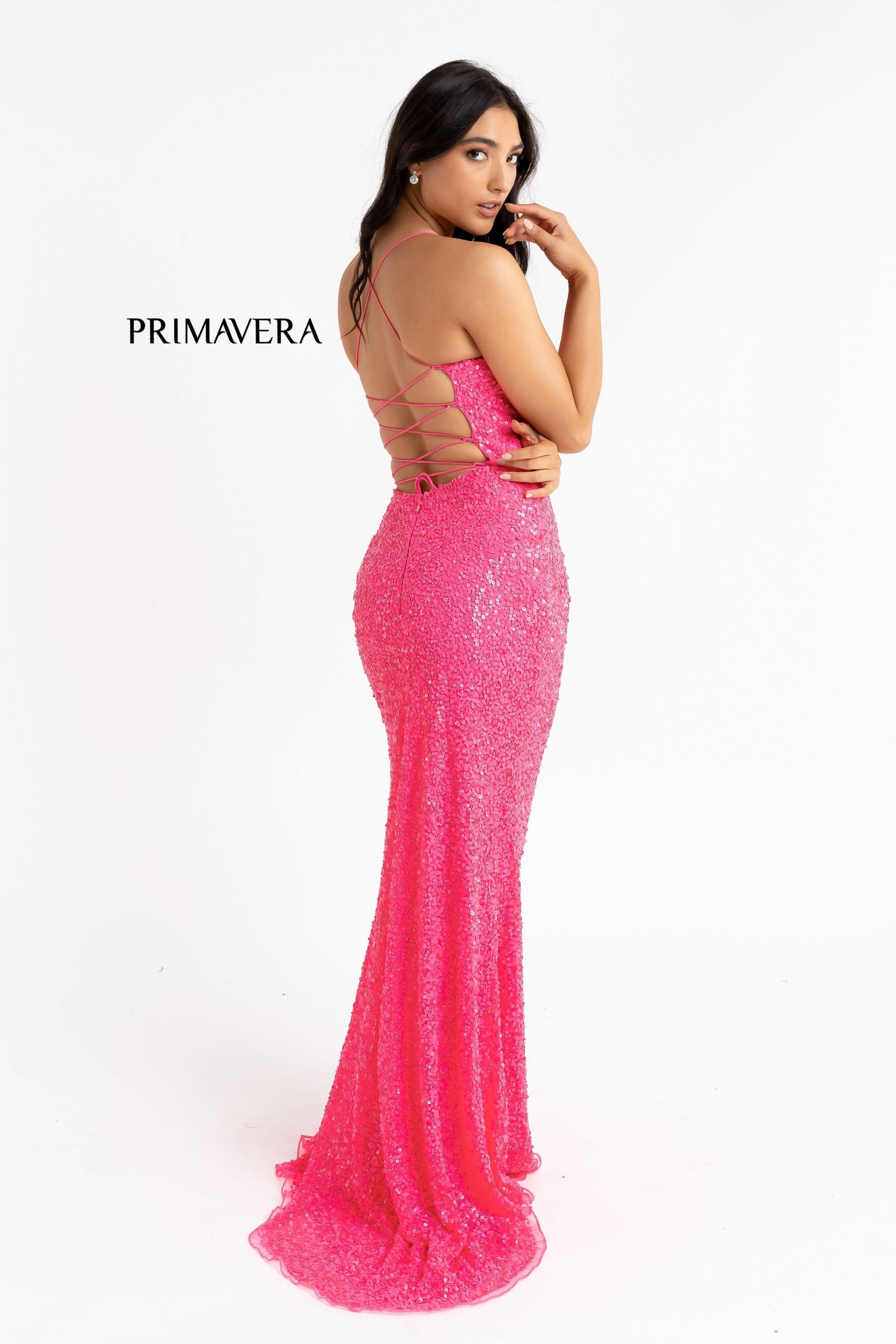 Primavera Couture 3290 This prom dress adds a pop to the multi sequins dress.  With a scoop neckline and spaghetti straps that cross and tie in the back.  This long evening dress has a side slit.  Available sizes:  000, 00, 0, 2, 4, 6, 8, 10, 12, 14, 16