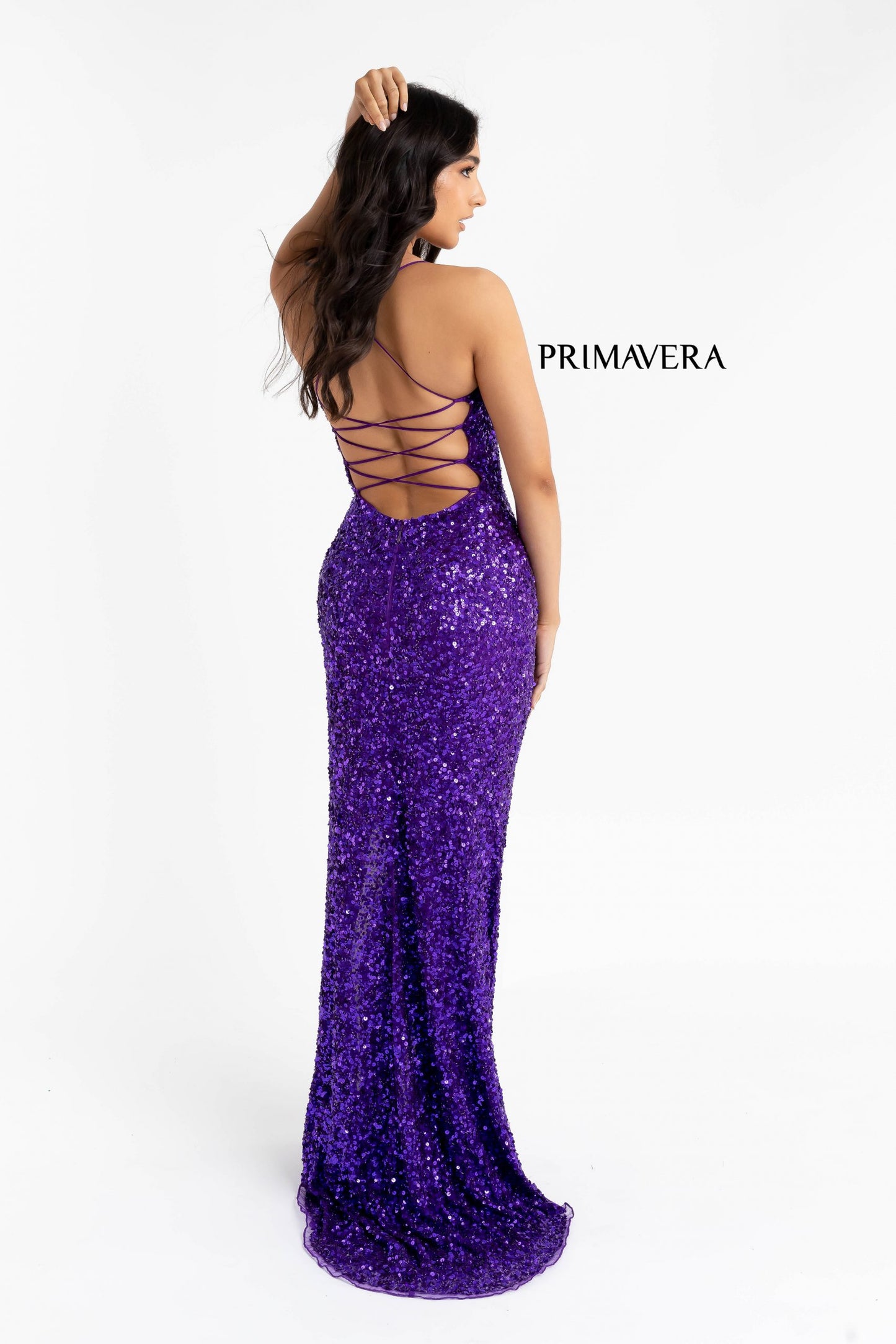 Primavera Couture 3290 This prom dress adds a pop to the multi sequins dress.  With a scoop neckline and spaghetti straps that cross and tie in the back.  This long evening dress has a side slit.  Available sizes:  000, 00, 0, 2, 4, 6, 8, 10, 12, 14, 16