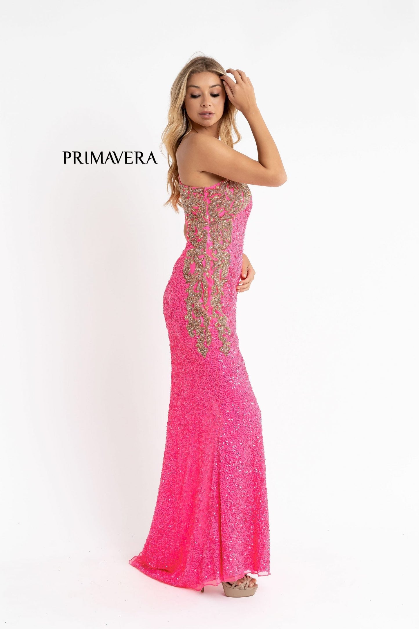 Primavera Couture 3637 is a stunning Long Fitted Sequin Embellished Formal Evening Gown. This One Shoulder Prom Dress Features Beaded Embellishments cascading from the one shoulder neckline down the side of the gown along the hip. Slit in skirt with a sweeping train. Great Pageant Formal Style.