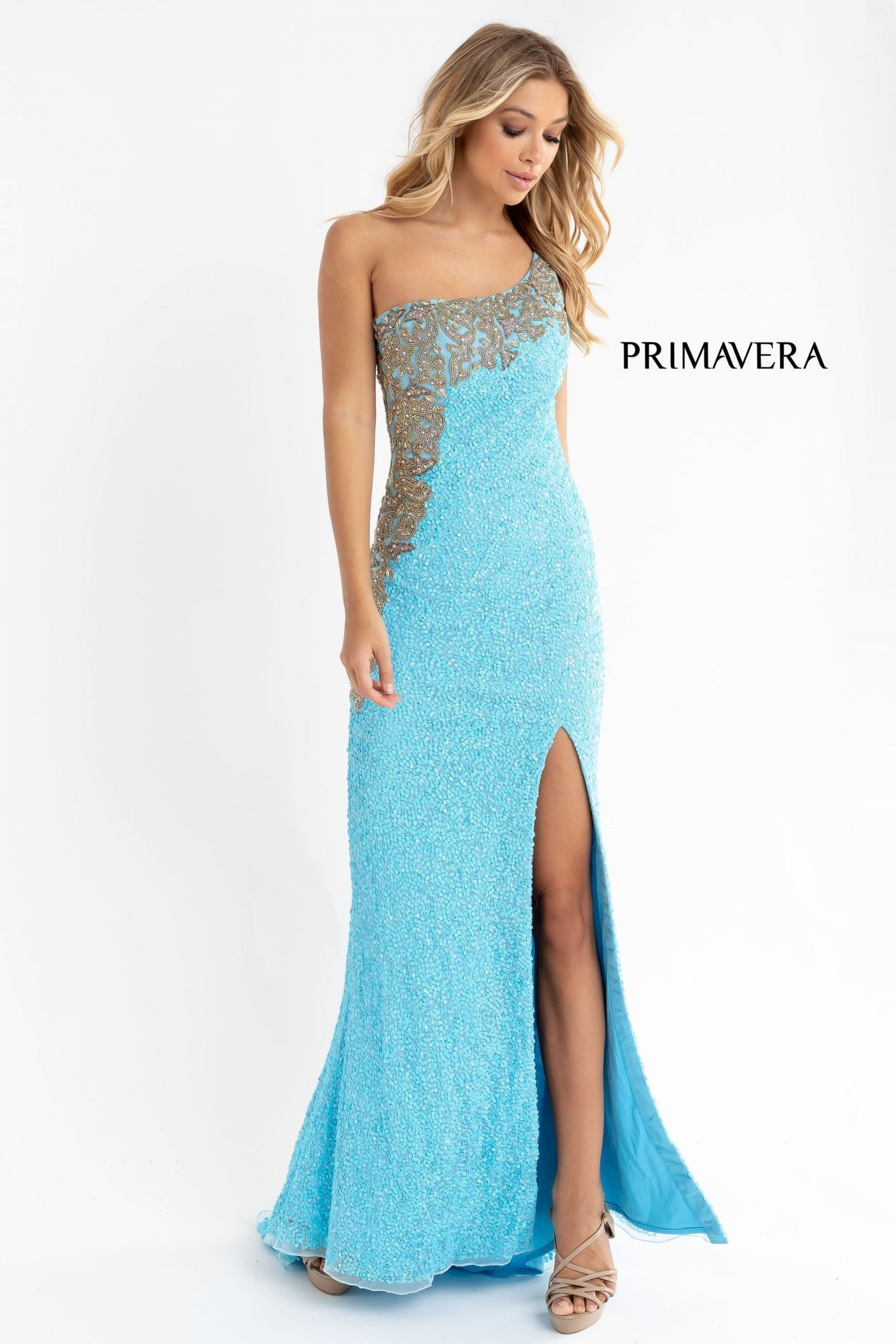 Primavera Couture 3637 is a stunning Long Fitted Sequin Embellished Formal Evening Gown. This One Shoulder Prom Dress Features Beaded Embellishments cascading from the one shoulder neckline down the side of the gown along the hip. Slit in skirt with a sweeping train. Great Pageant Formal Style.