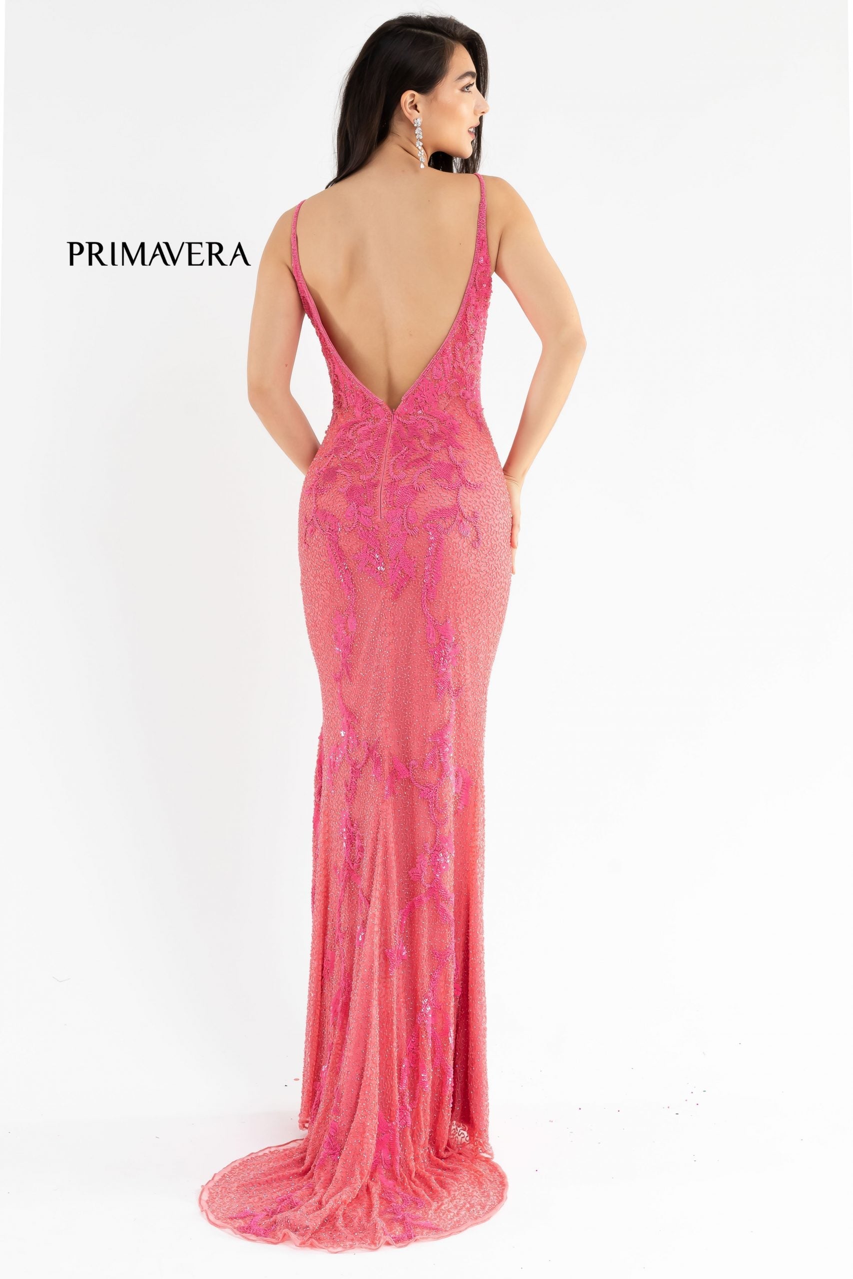 Primavera Couture 3727 This is a beautiful long beaded prom dress.  The V neckline is surrounded by gorgeous floral details that extend down the sides of the dress.  The back is a v open back and the skirt has a slit and sweeping train.  A magnificent choice for prom or formal evening dress.  Available colors:  Midnight, Black, Ivory, Mint, Red, Rose, Neon Pink,   Available sizes:  000-24