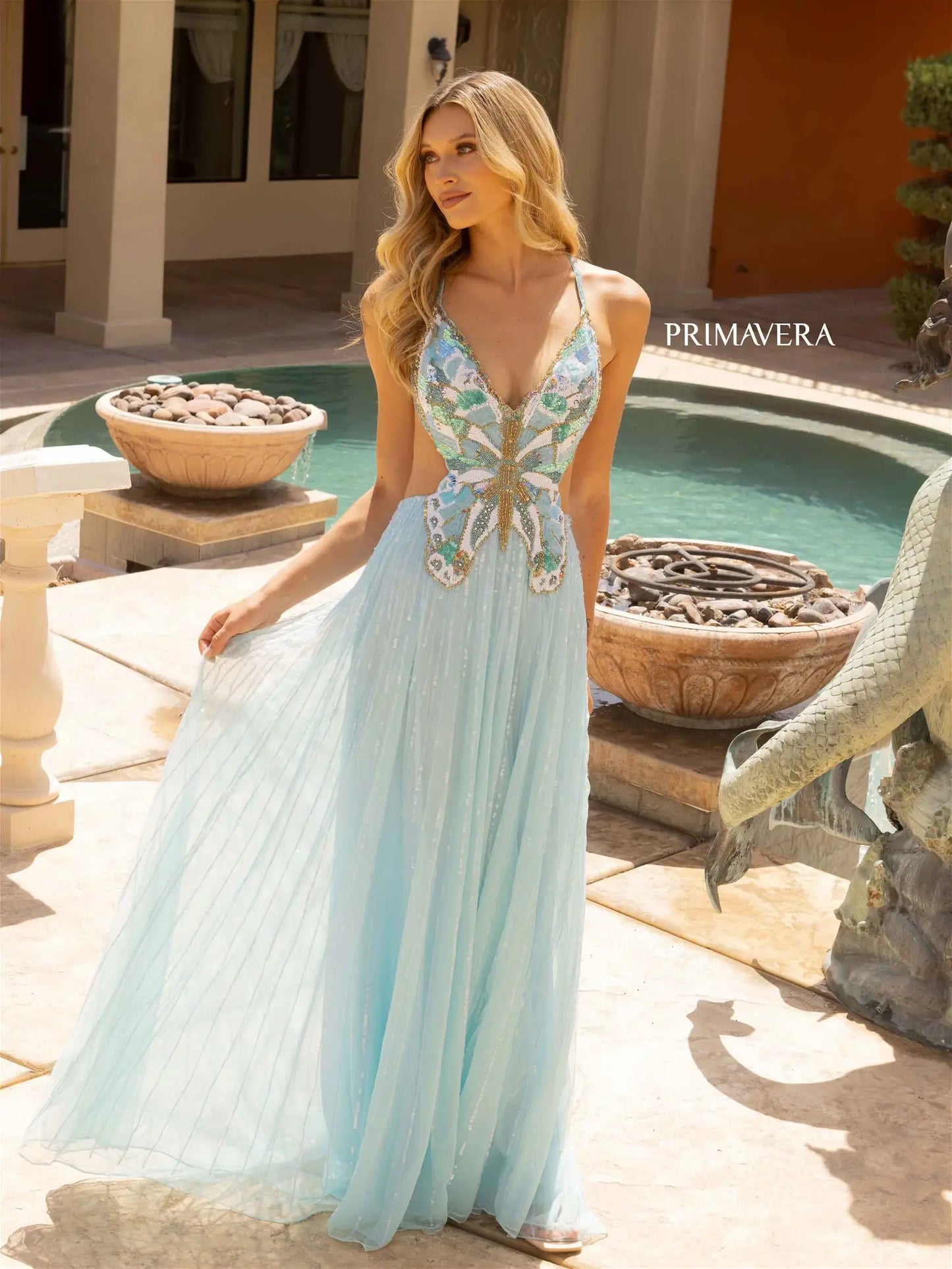 Primavera Couture 3957 Prom Dress Long Beaded Gown. This gown has a beautiful butterfly design on it. Such a beautiful hand beaded gown.