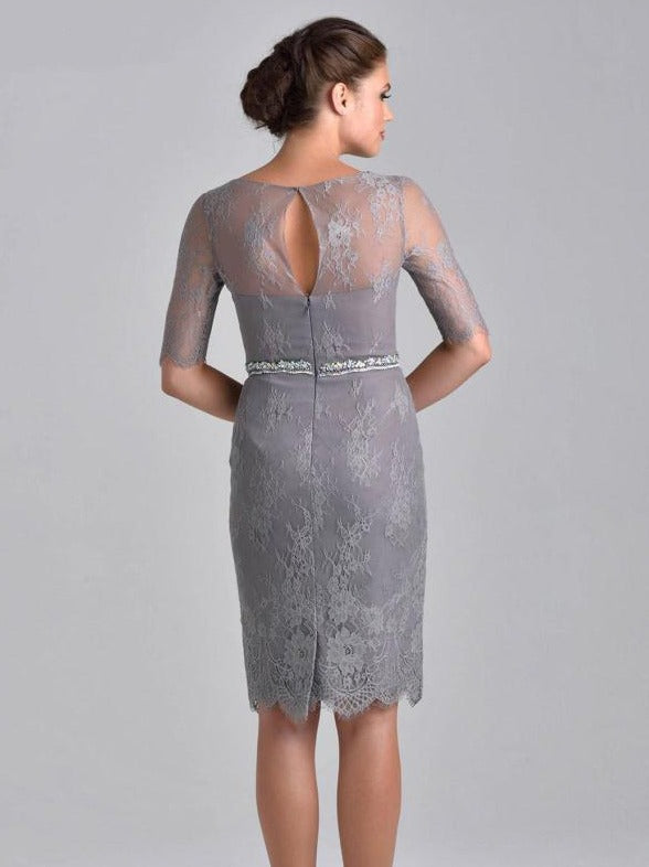 Nina Canacci M214 is a short fitted formal evening cocktail dress. featuring a sheer eyelash lace high neckline and lone 3/4 sleeves. Fitted solid lace knee length gown has eyelash lace hem. Perfect for wedding guest, Mother of the Bride/Groom, Formal & Semi formal events! Matching solid 3/4 cuff sleeve bolero jacket.  Available Sizes: 6, 8, 10, 12,18  Available Colors: Grey, Black, Wine, Navy