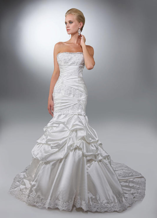 DaVinci Bridal 50084 Available in Size 10 Ivory strapless mermaid wedding dress  Taffeta fit and flare gown with a strapless neckline trimmed with beading. Lace applique on the bodice is wrapped with pleated taffeta. Pick ups at top of the skirt and a lace hem on the bottom skirt with a lace up back. 