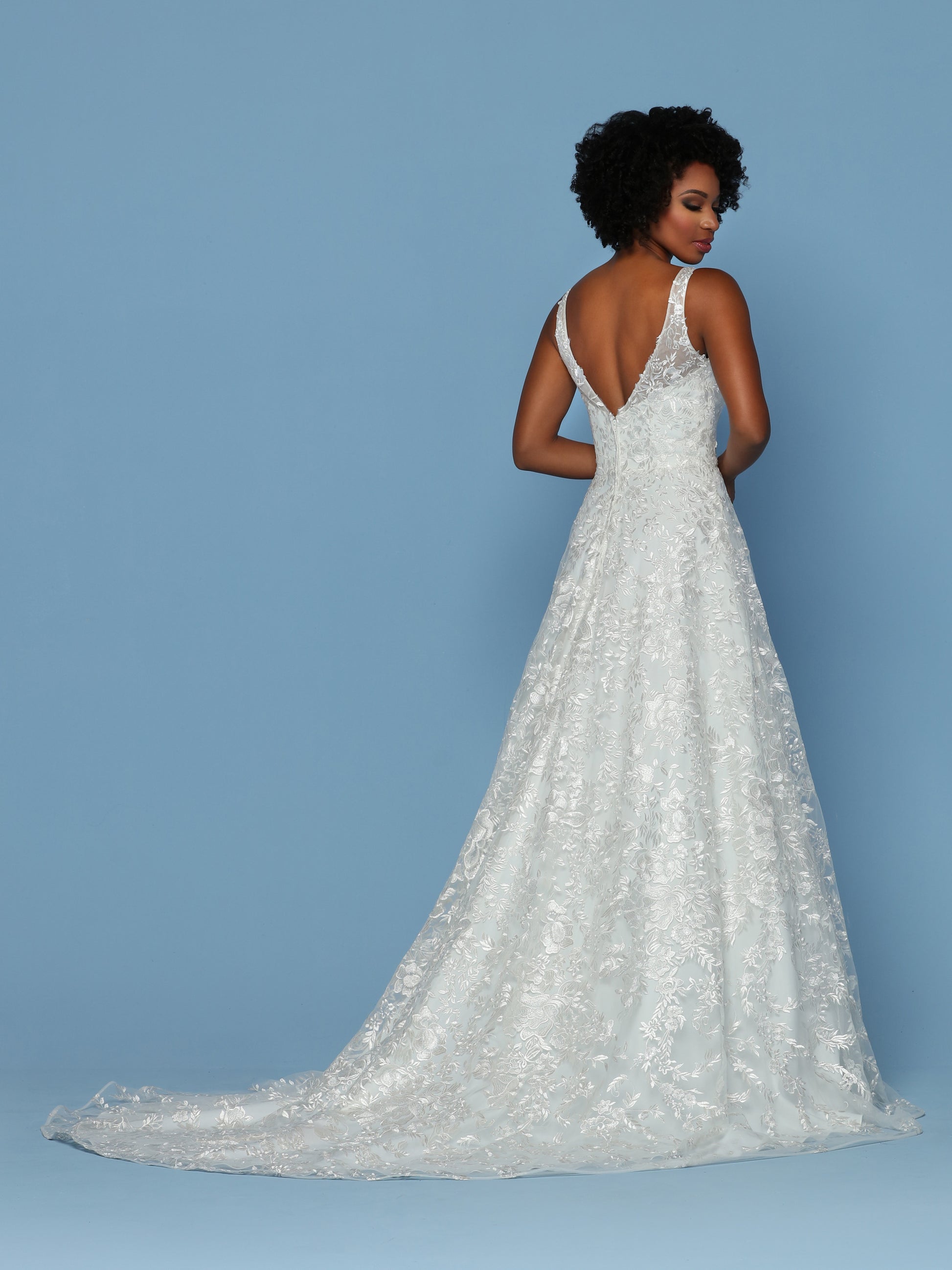 Davinci Bridal 50554 is an all over Embroidered Lace A Line Wedding Dress. This Ball gown features a V Neckline with sheer embroidered lace straps leading to an open V Back.  Available for 1-2 Week Delivery!!!  Available Sizes: 2,4,6,8,10,12,14,16,18,20  Available Colors: Ivory