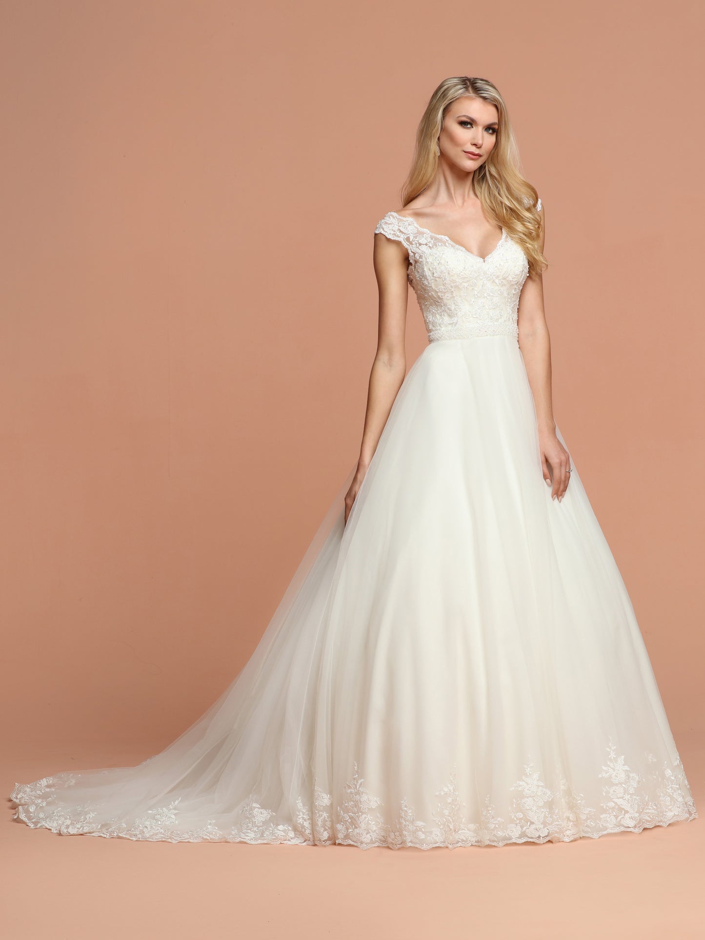 Davinci Bridal 50584 is a Full Tulle Ballgown Wedding Dress with a train. Beautiful Bodice features a sweetheart neckline with a lace illusion v neck and open v back. Embellished attached Waist Belt.  Available for 1-2 Week Delivery!!!  Available Sizes: 2,4,6,8,10,12,14,16,18,20  Available Colors: Ivory  Available Colors: Ivory, Whit