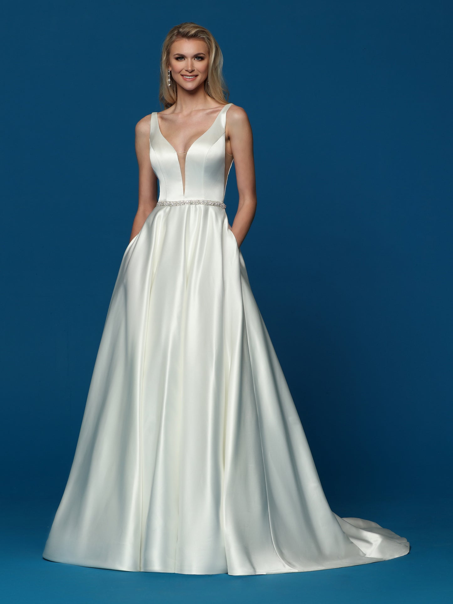 Davinci Bridal 50656 is a long satin A line wedding dress.  This bridal gown has a v neckline and an embellished waistline.  And it has Pockets! Colors:  Ivory  Sizes:  2-20