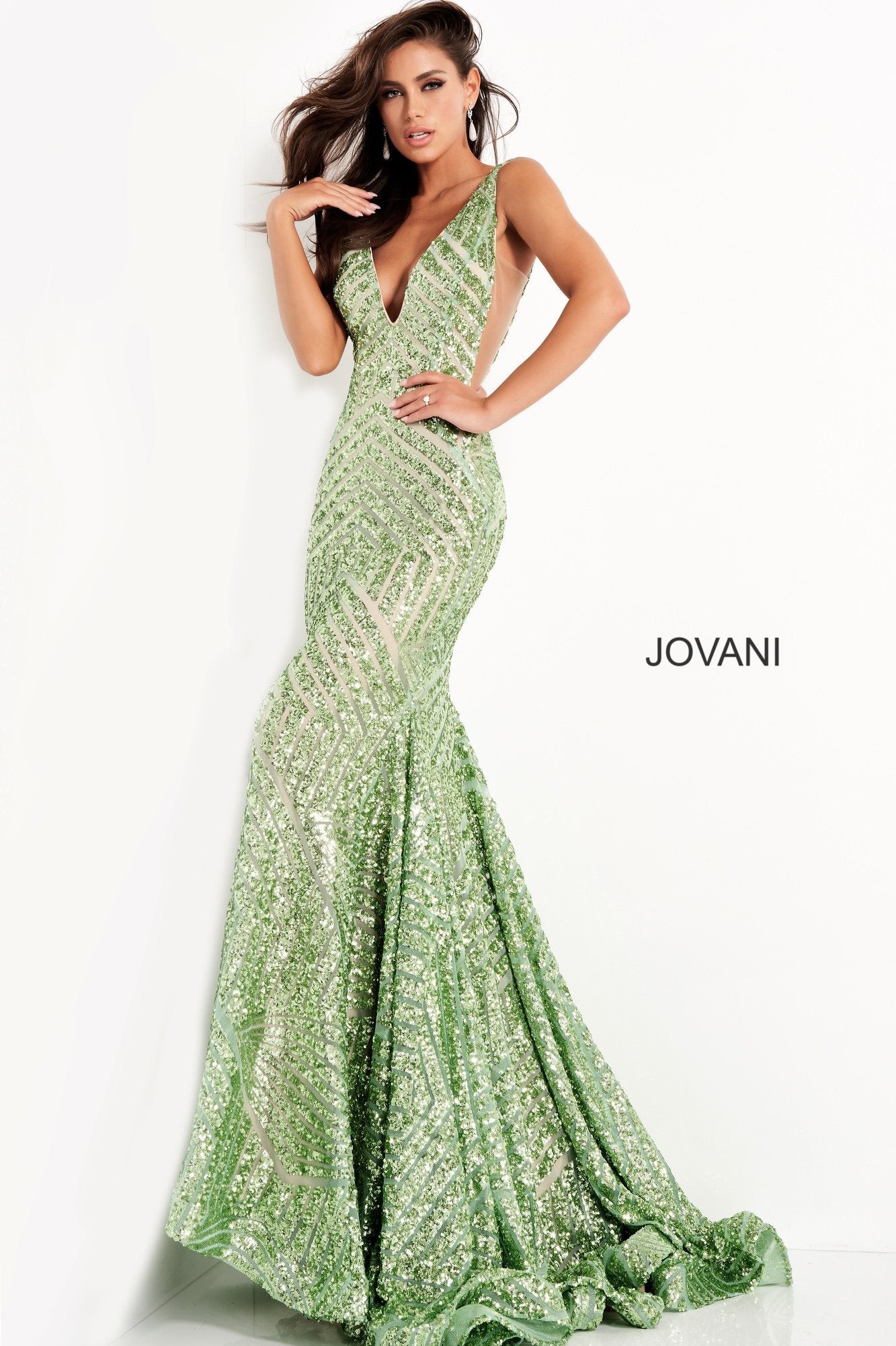 Long Jovani 59762 Prom Dress, Featuring a plunging neckline & A Fully sequined Fitted Mermaid Bodice. This Open V Back Pageant Gown & prom dress is perfect for the stage is has a lush trumpet sequin embellished skirt and sweeping train. 