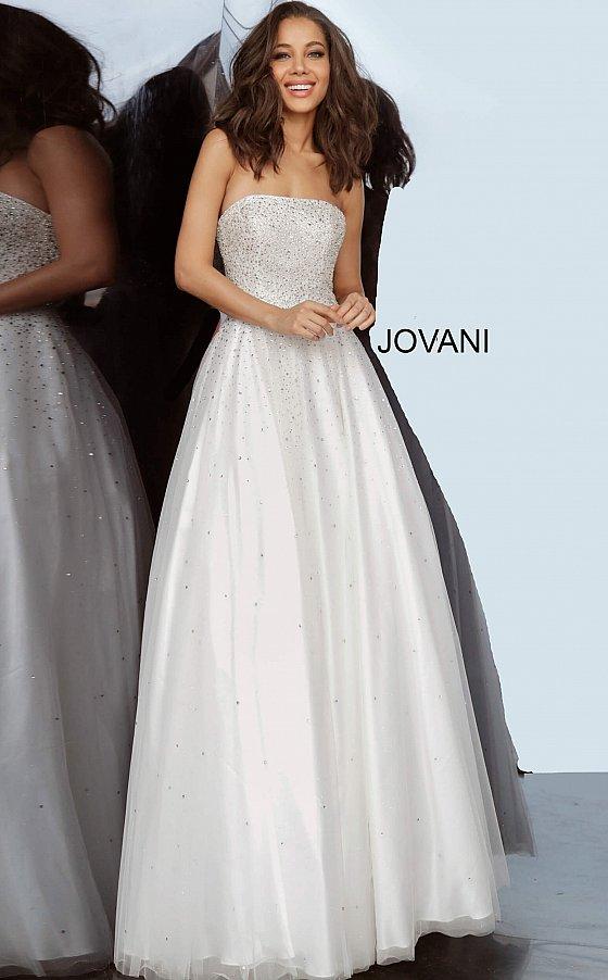 Jovani 65664 is a Prom Dress, Pageant Gown & simple wedding dress. Embellished tulle ballgown, fully lined, full floor length skirt, strapless bodice, straight neckline, lace up back. Available Sizes: 00-24  Available Colors: light-blue, light-pink, off-white