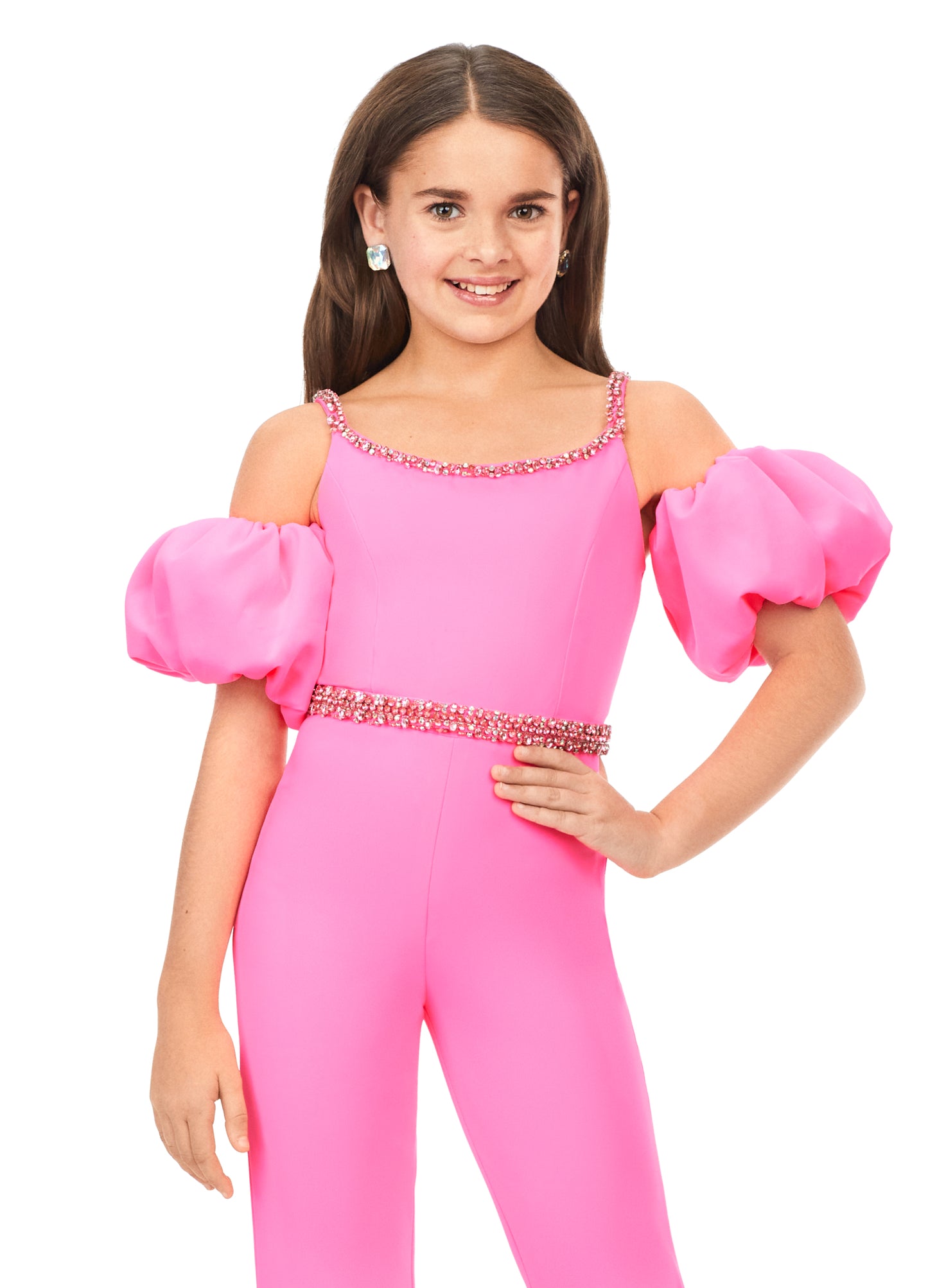 Ashley Lauren Kids 8164 Girls Off Shoulder Scuba Jumpsuit with Puff Sleeves  A scuba jumpsuit with off shoulder puff sleeves? We're obsessed! This jumpsuit has a beaded neckline and waist band to offer the right mix of classy and fabulous.