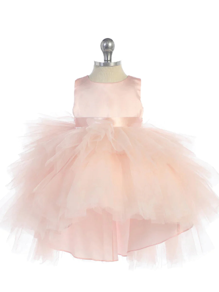 This Tip Top 5658 Girls Layered Tulle High Low Skirt Formal Dress is a perfect choice for that special day. The tulle high-low skirt, satin formal gown, and flower girl satin sash come together to create a beautiful, unique look perfect for flower girls, junior bridesmaids or formal occasions.  Sizes: 6M-16  Colors: Black, Blush, Burgundy, Eggplant, Ivory, Red, Royal Blue, White, Champagne, Lilac, Sky Blue