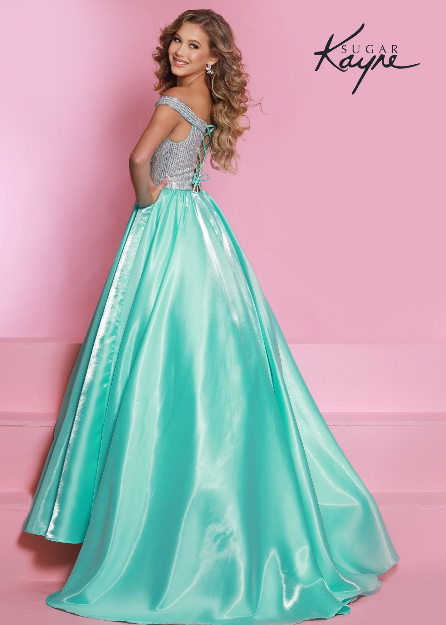 Sugar Kayne C313 Long Shimmer Satin off the shoulder Girls Pageant Dress Crystal Bodice Product Details Twinkle twinkle little star – what a princess you will be! Shine bright in this shimmer satin ballgown. The bodice is completed with fully beaded rhinestone trim and off-the-shoulder straps.  Color Aqua, Royal, Red, White  Size 2, 4, 6, 8, 10, 12, 14, 16  Fabric Shimmer Satin, Satin Lining