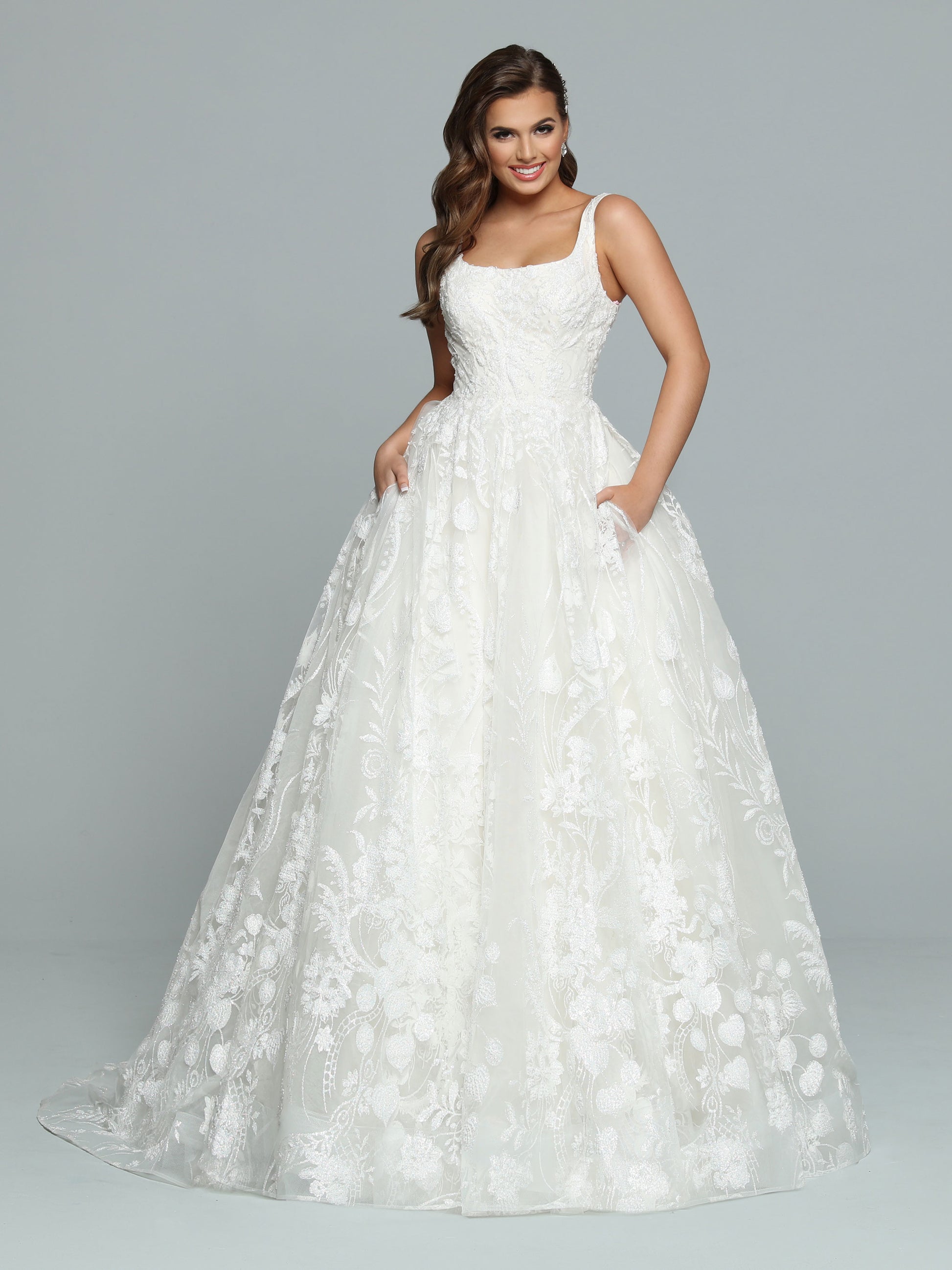 Davinci Bridal 50669 Ivory Wedding Dress Ballgown is a Gorgeous Shimmering A Line Ball gown with pockets! scoop neckline with wide straps. Pearlette accented shimmer lace.