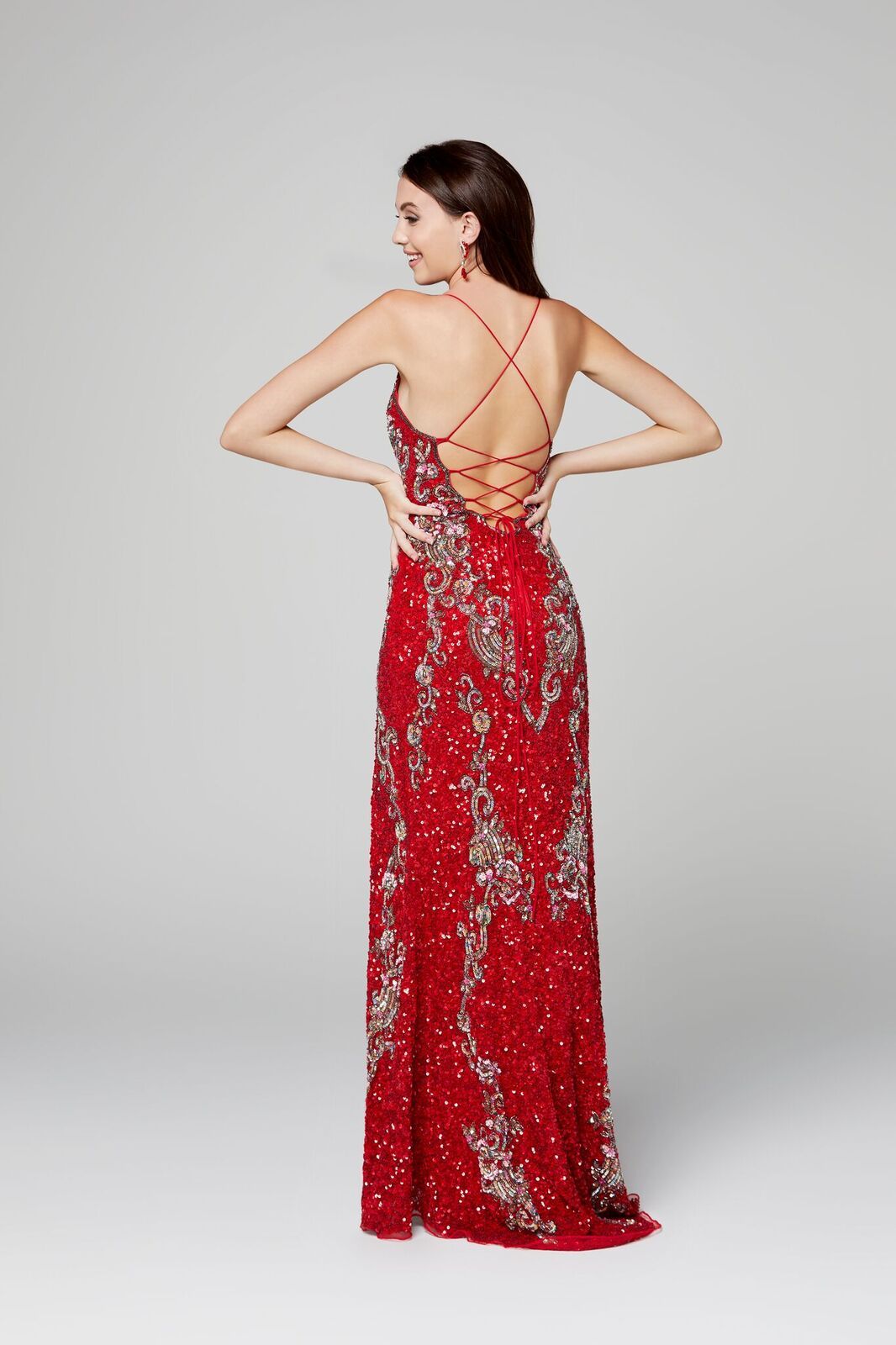 Primavera Couture 3211 is a Long sequin Embellished Evening Gown Formal Dress  Available Colors: Midnight Multi,  Platinum Multi, Red, Black, Charcoal, Ivory   Fully beaded prom dress with floral pattern and side slit. Long Sequin Gown featuring a v neckline. slit in the fitted skirt.