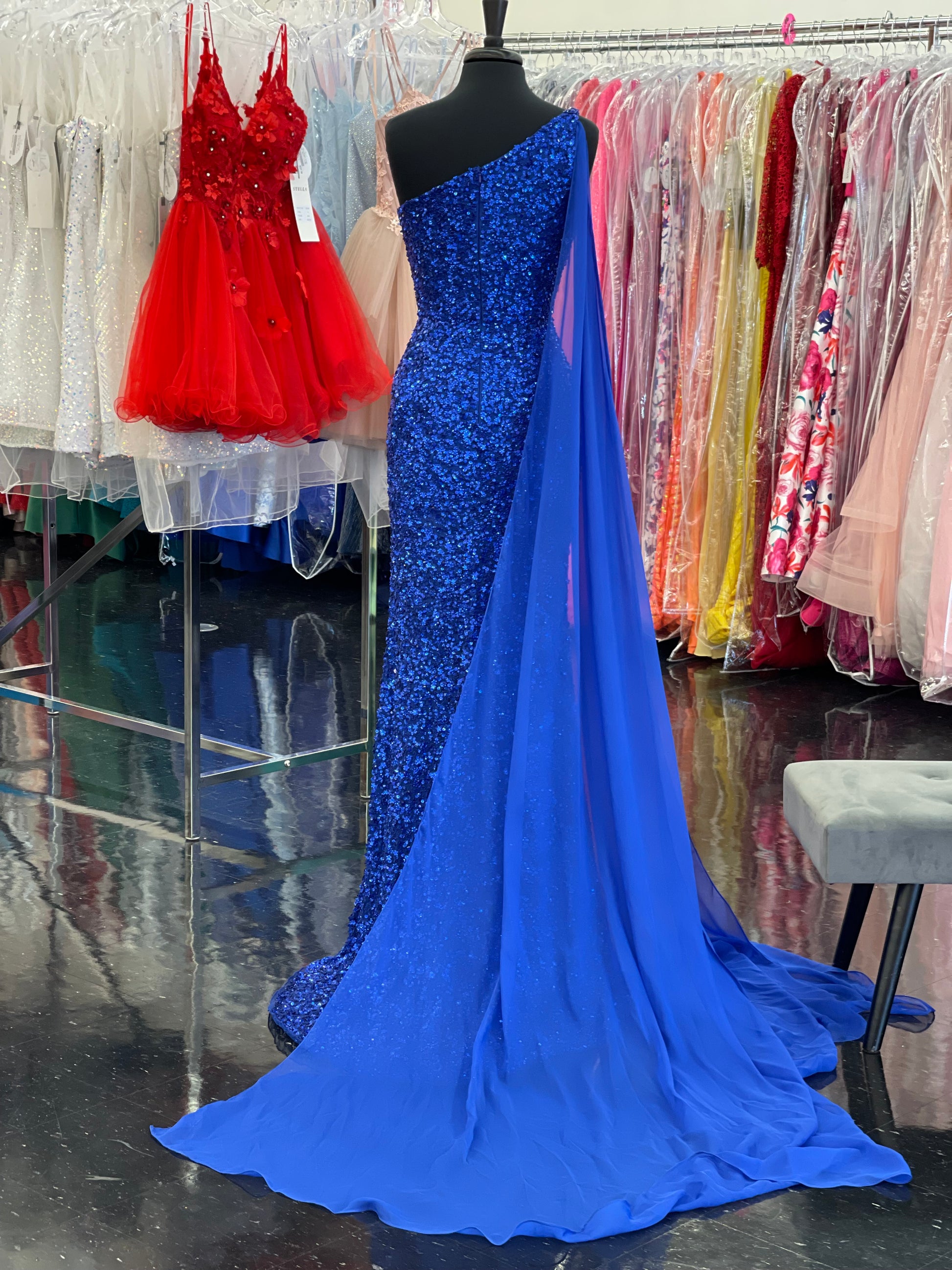 Ashley Lauren 11371 One Shoulder Prom Dress fully sequence with shoulder cape and slit.  Colors : Candy Pink, AB Turquoise, Coral, Emerald, Royal, Sky  Sizes: 0-24  One Shoulder Shoulder cape Slit Fully sequenced 